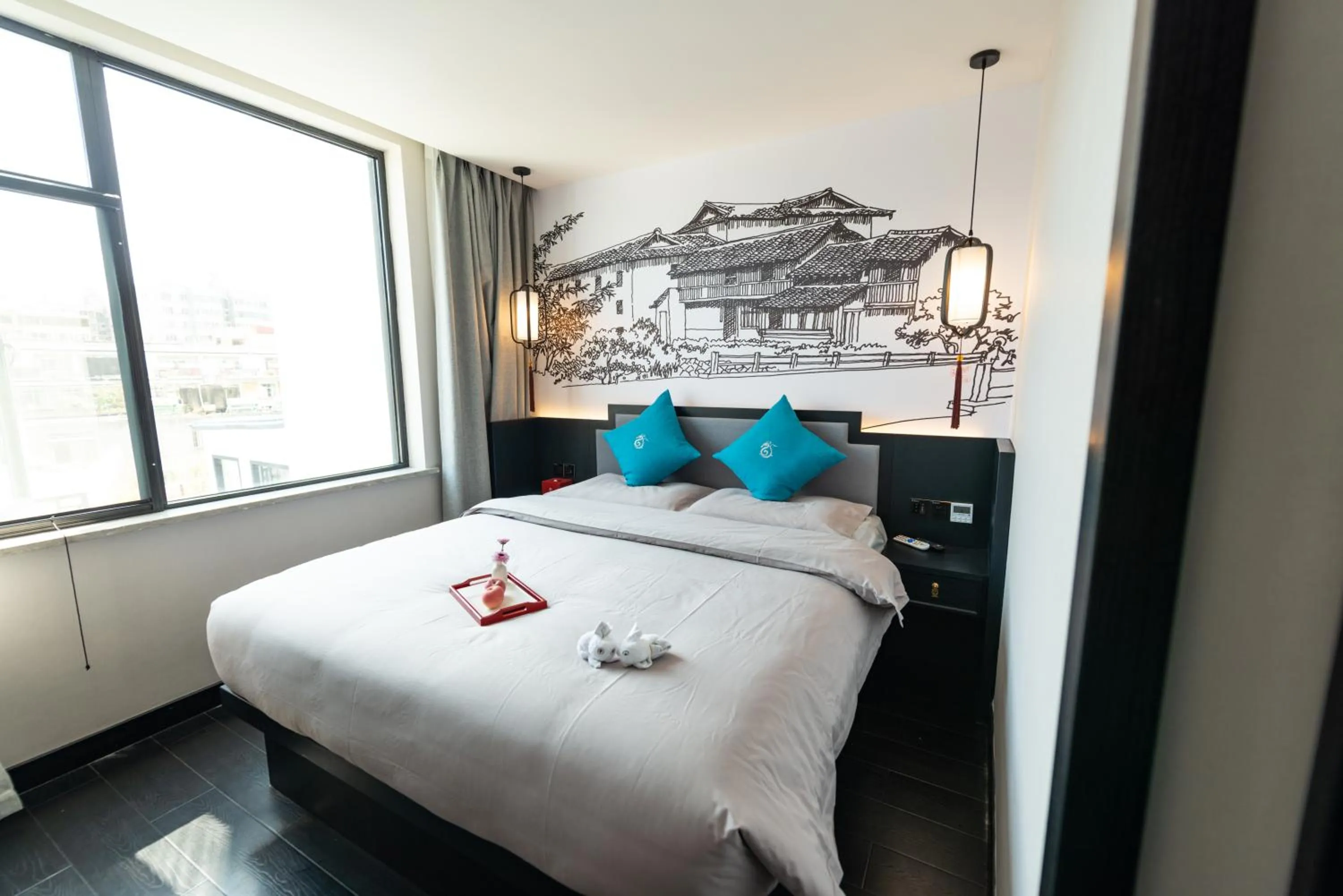 Bed in Gong Xili Qingdu Hotel