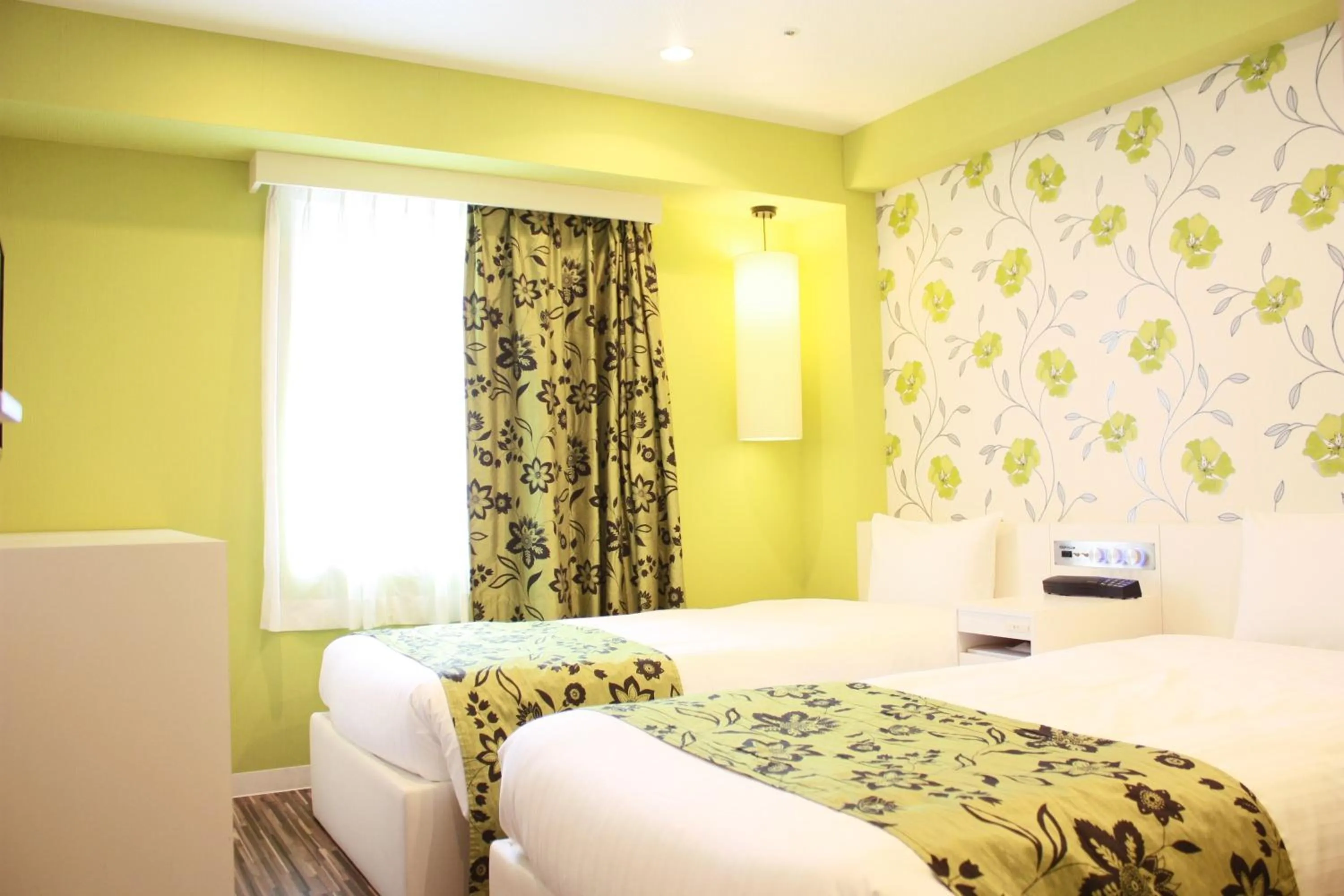 Bed in Hotel LiVEMAX Umeda Central