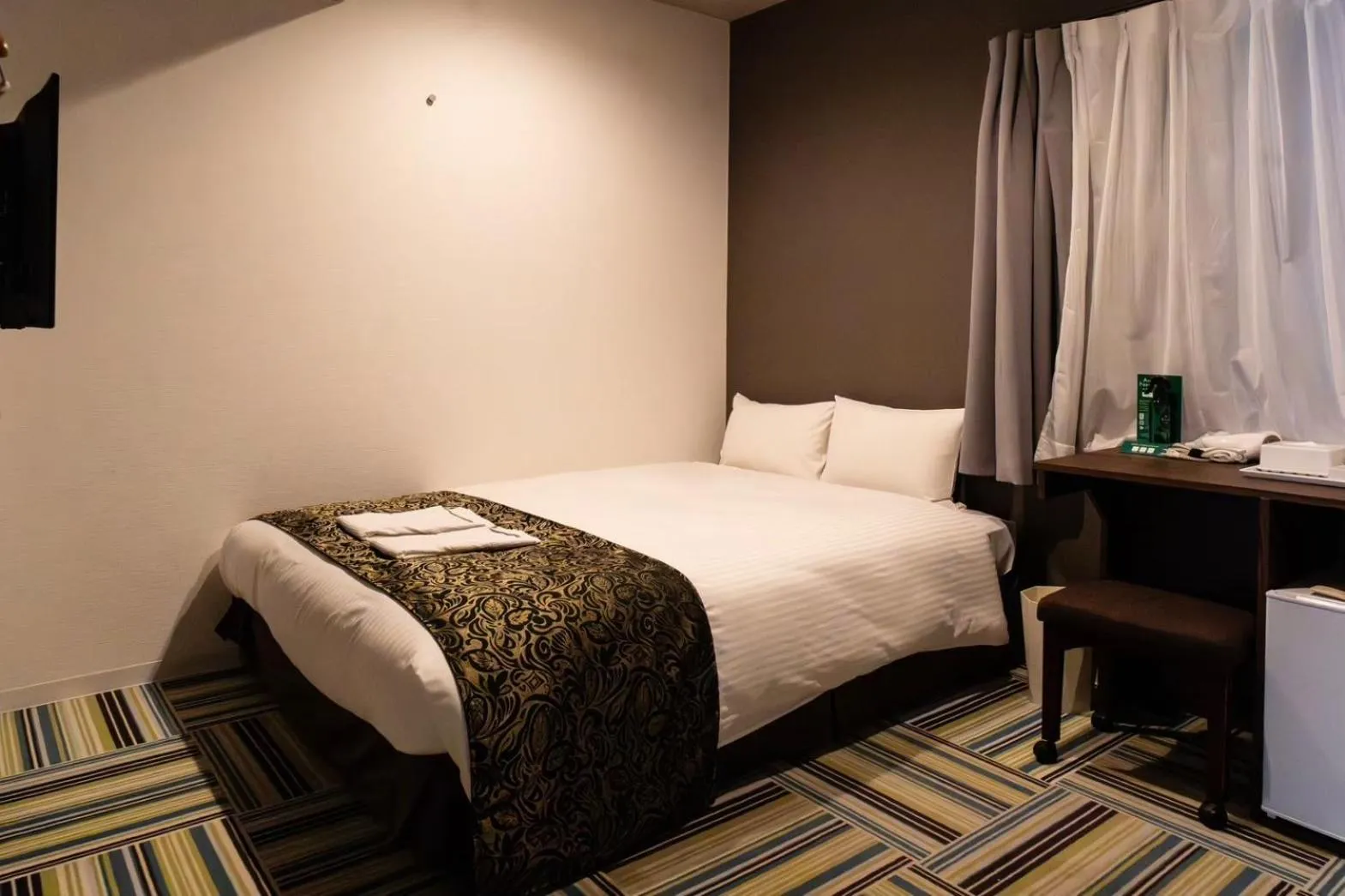 Bed in Hotel LiVEMAX Umeda Central