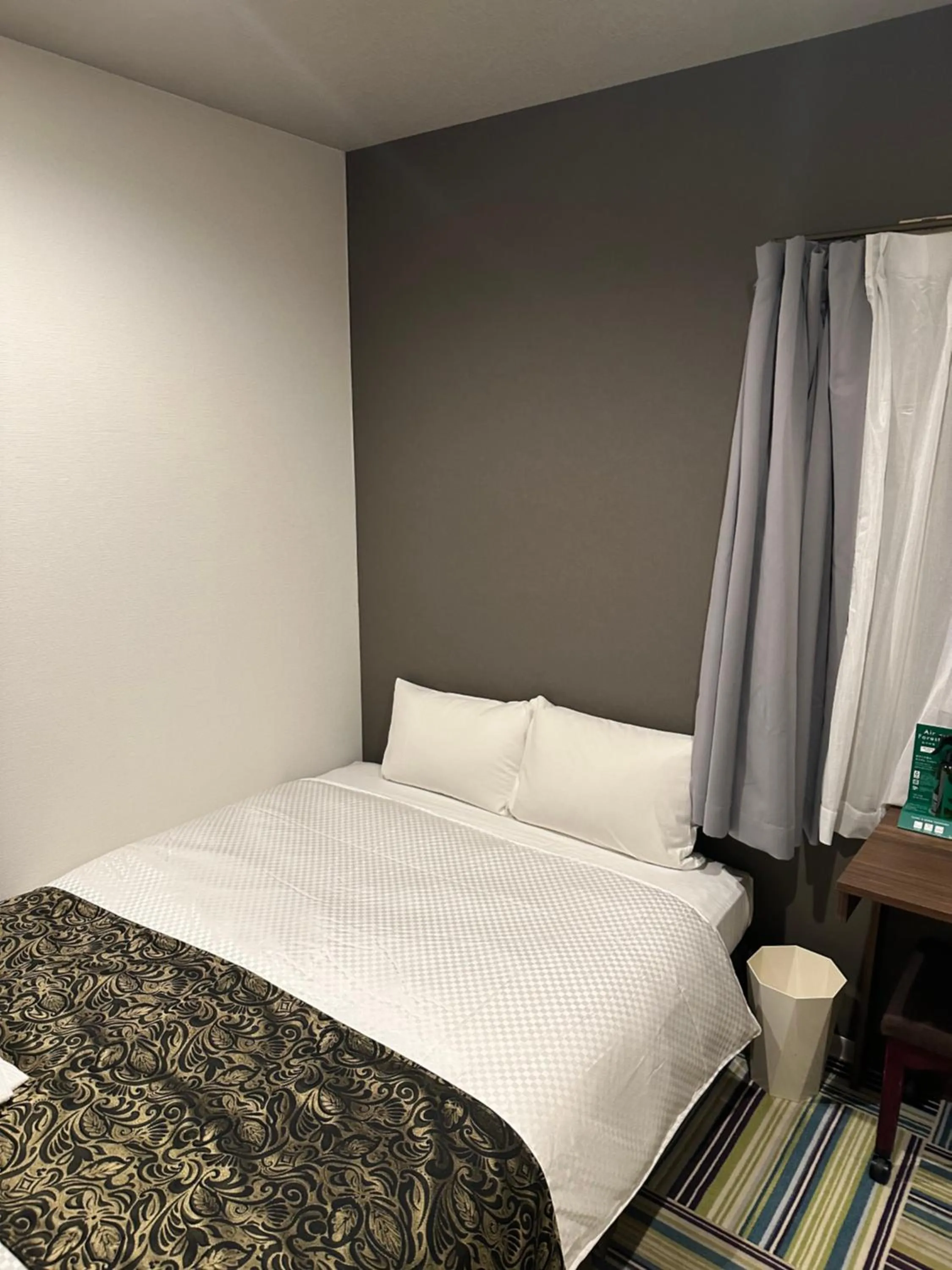 Bed in Hotel LiVEMAX Umeda Central