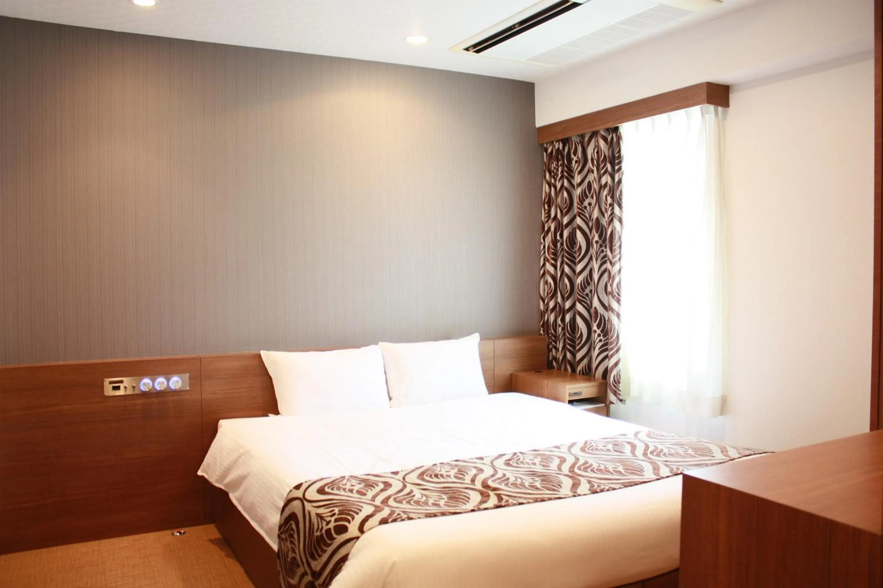 Photo of the whole room, Bed in Hotel LiVEMAX Umeda Central