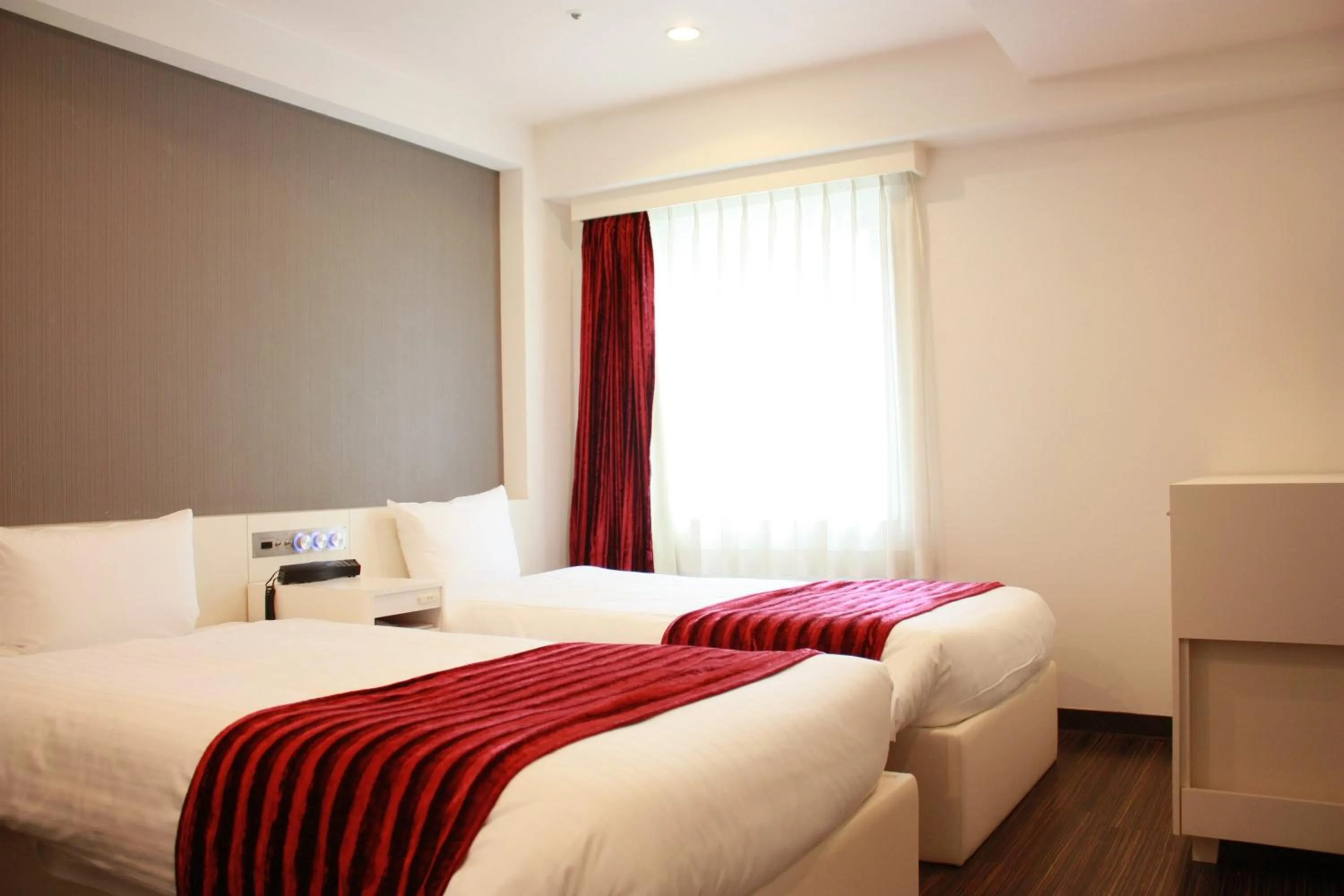 Bed in Hotel LiVEMAX Umeda Central