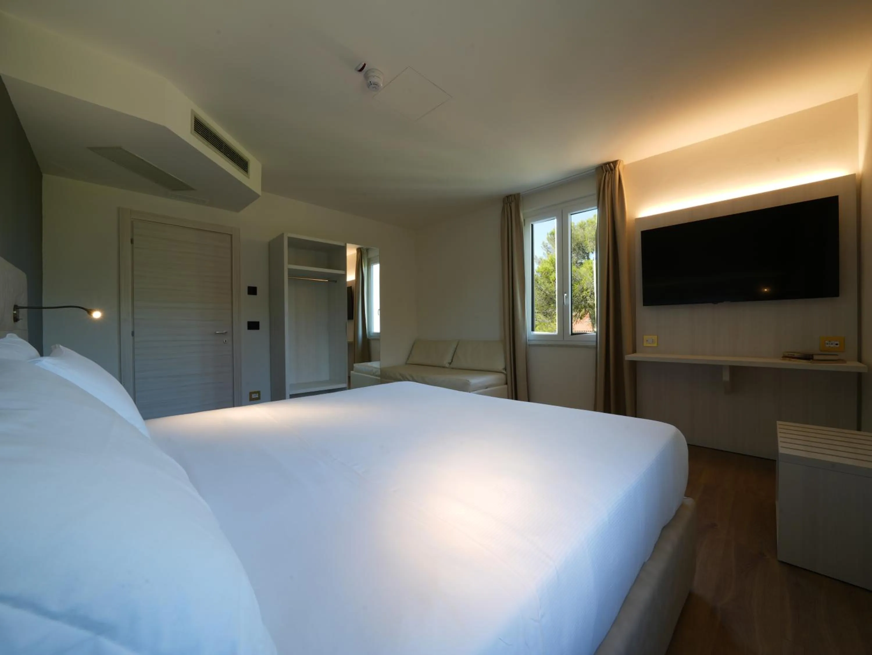 Photo of the whole room, Bed in Hotiday Castiglioncello Suite