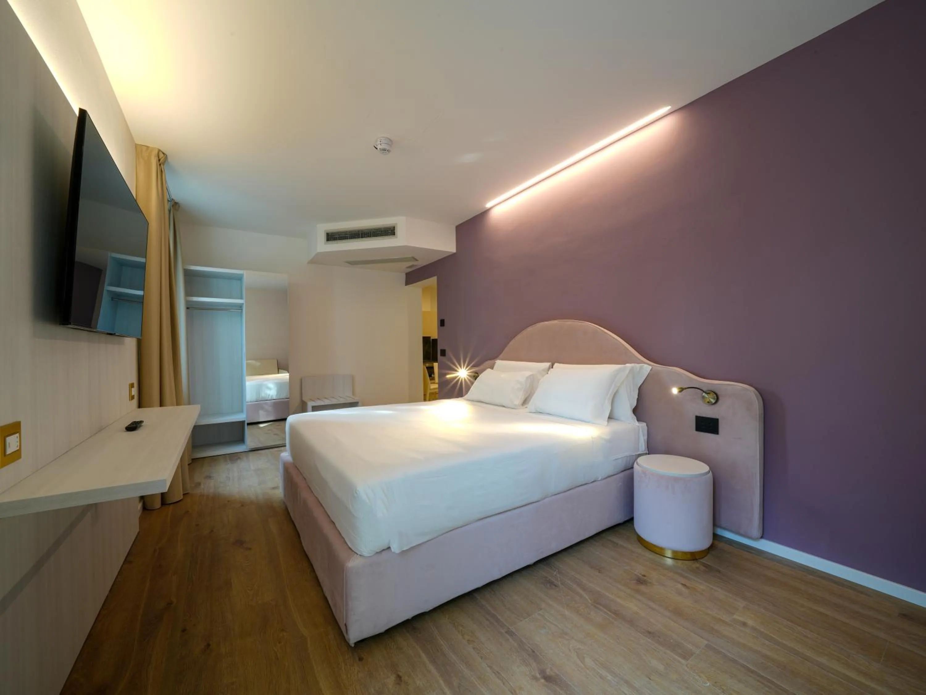 Photo of the whole room, Bed in Hotiday Castiglioncello Suite