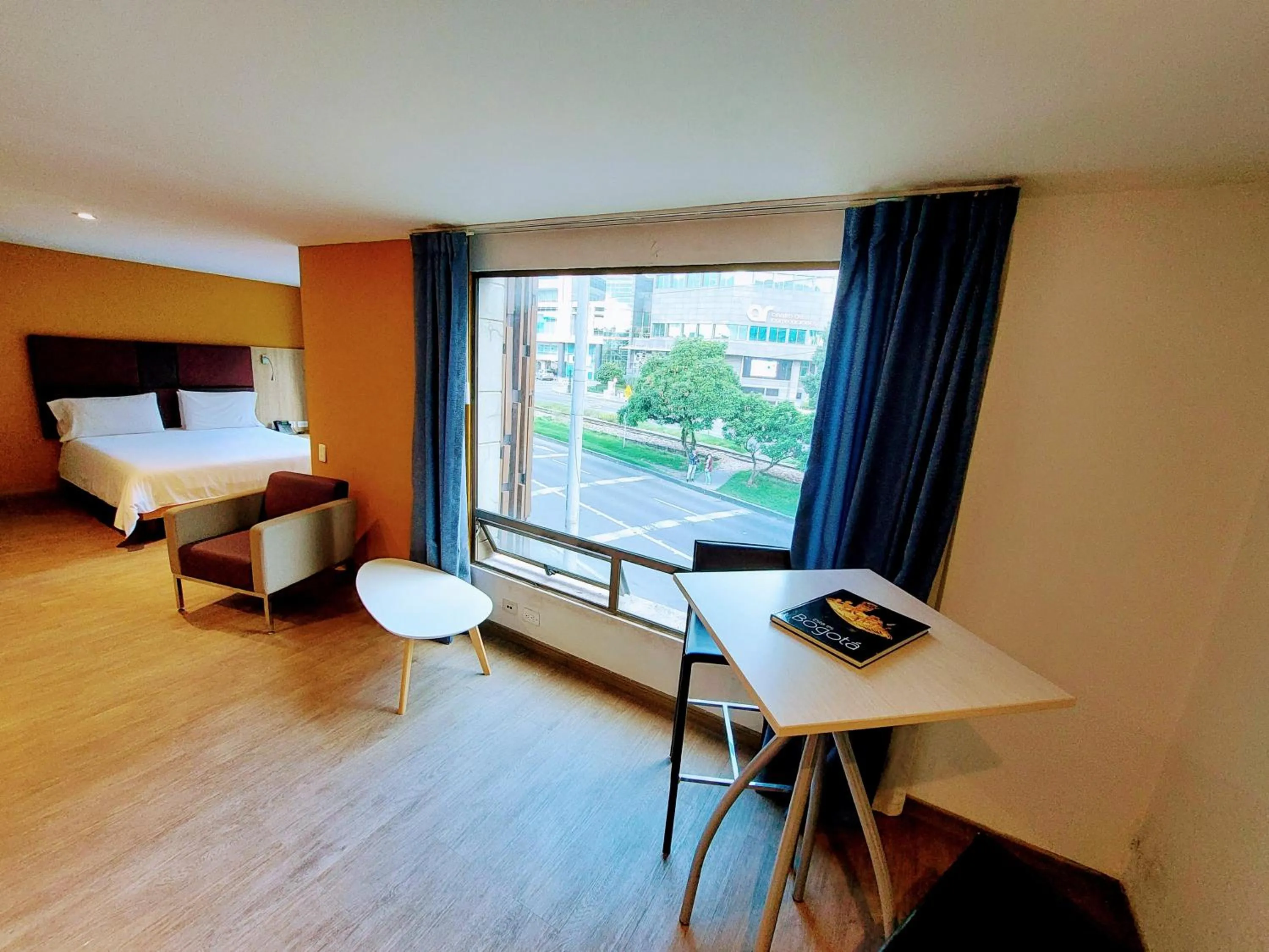 Seating area, Bed in Hotel Viaggio Teleport City Suites