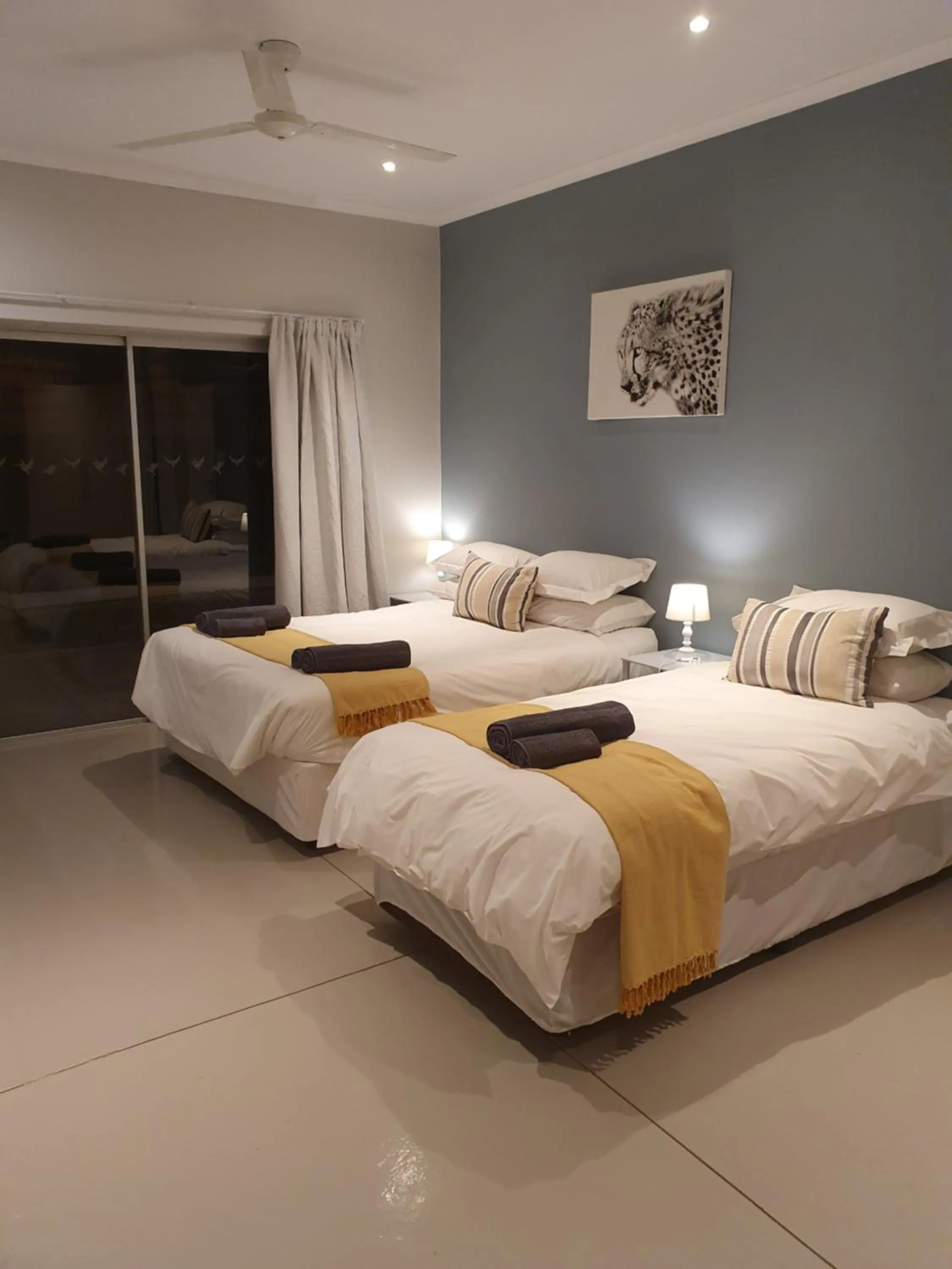 Bed in Kingfisher Creek Safari Cottages