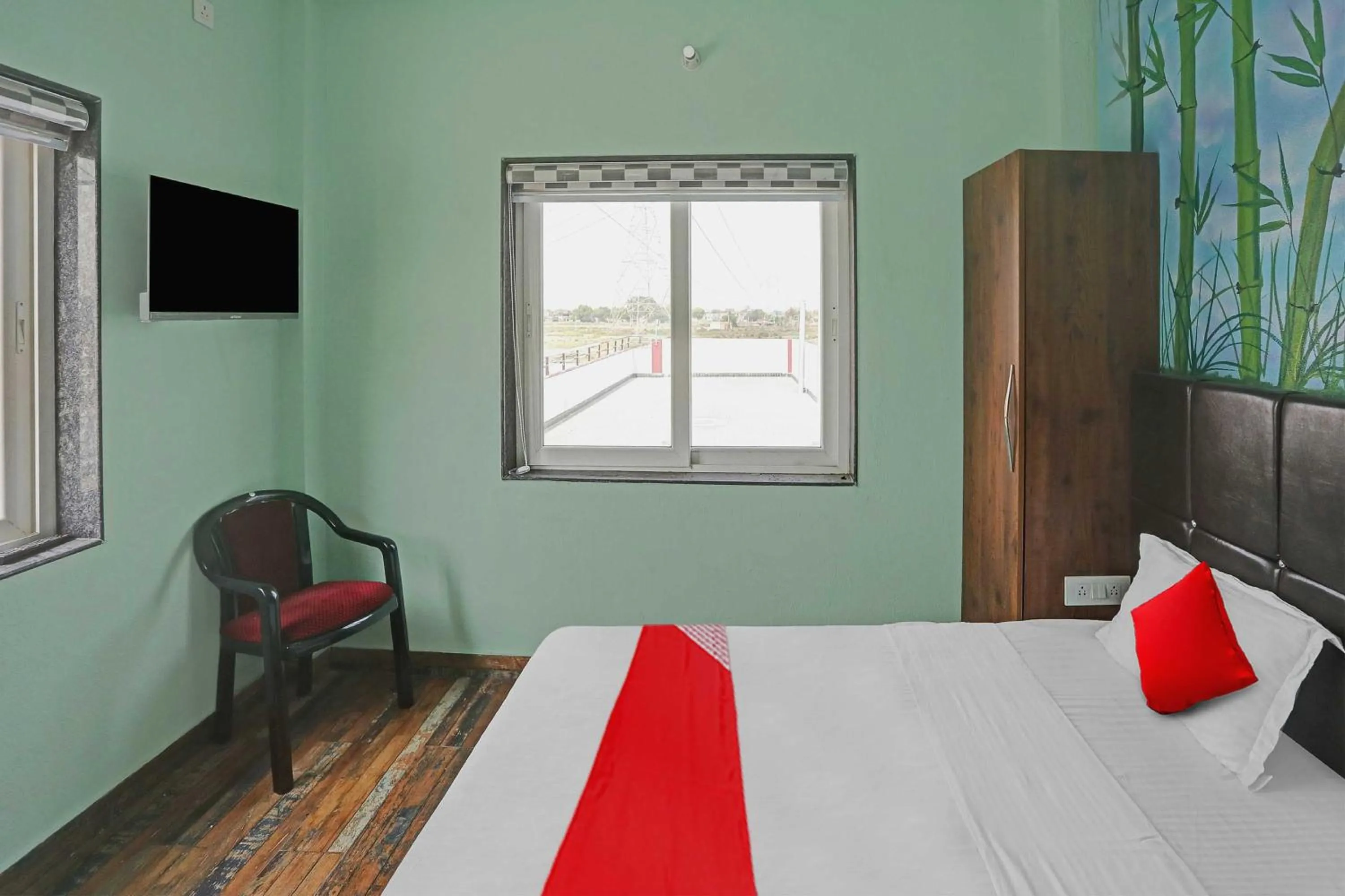 Bedroom in Hotel O MH Inn