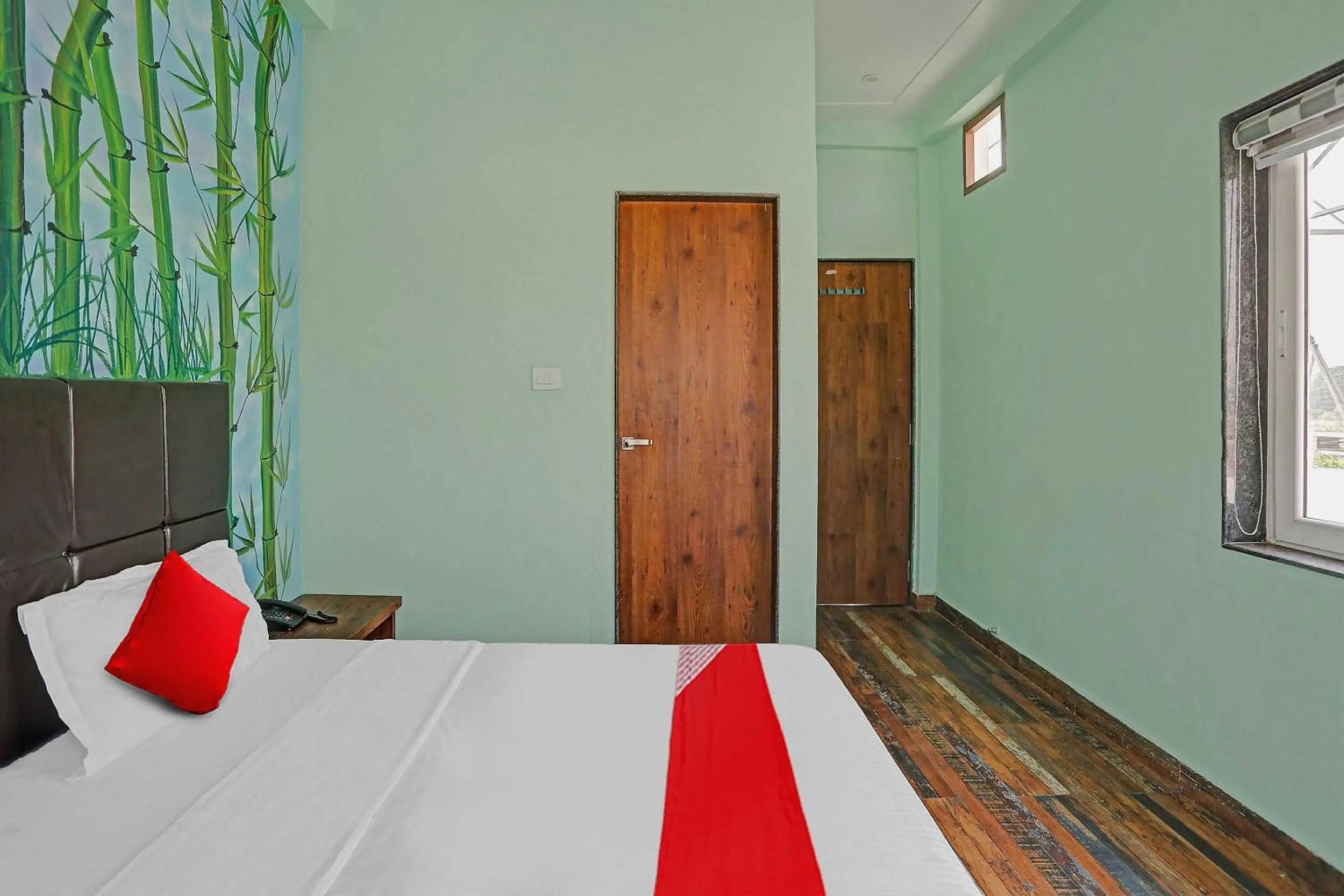 Bedroom in Hotel O MH Inn