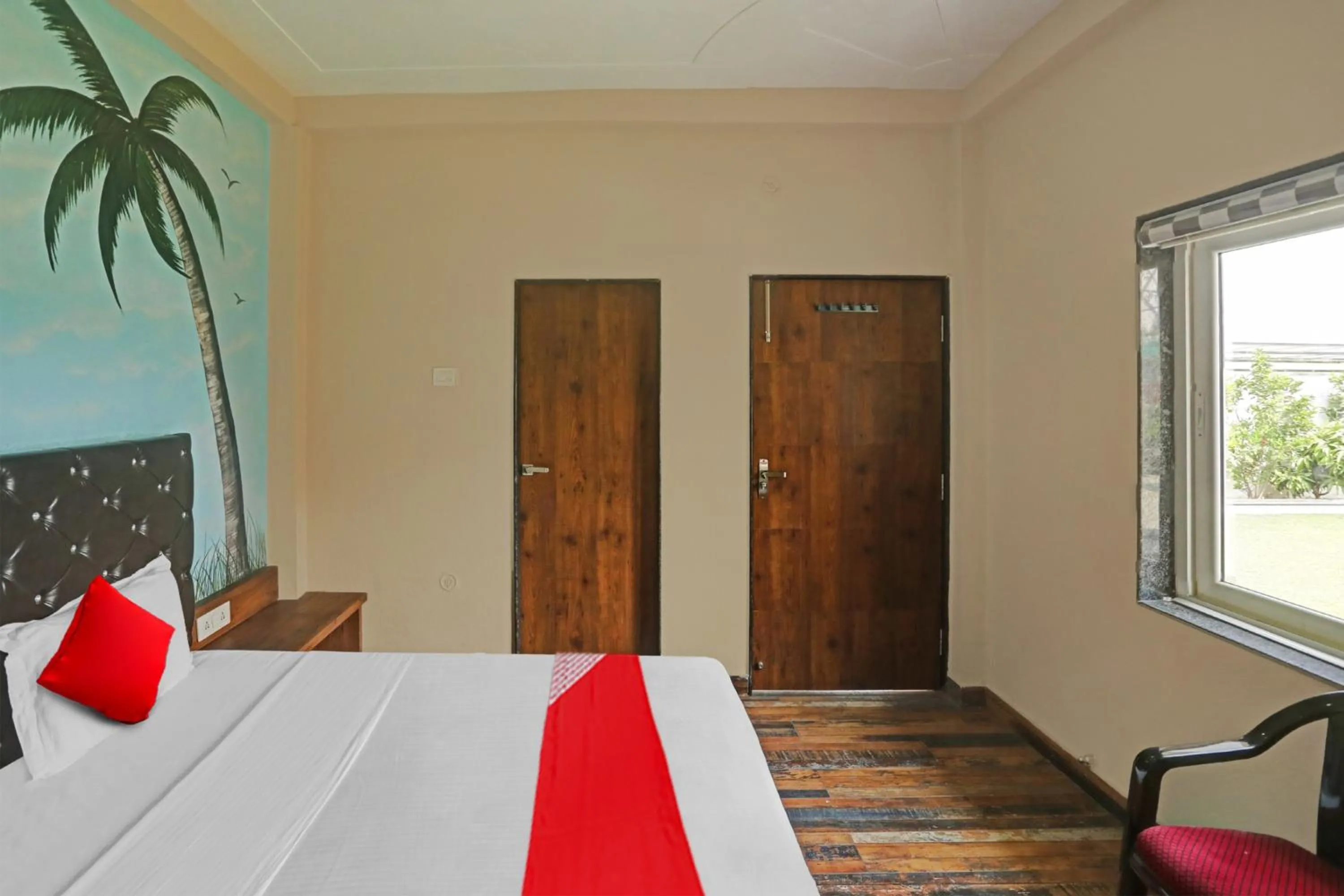 Bedroom in Hotel O MH Inn