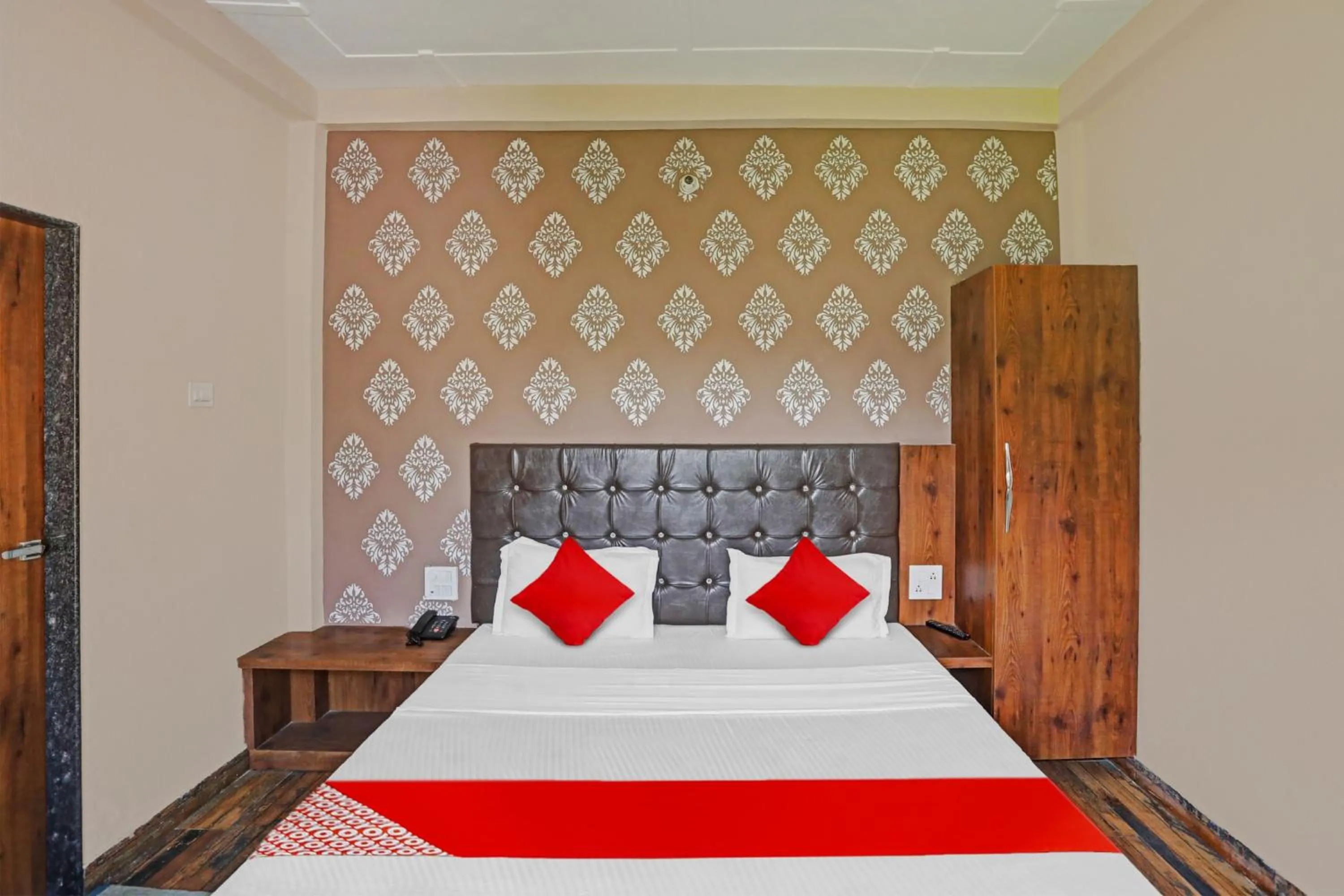 Bedroom in Hotel O MH Inn