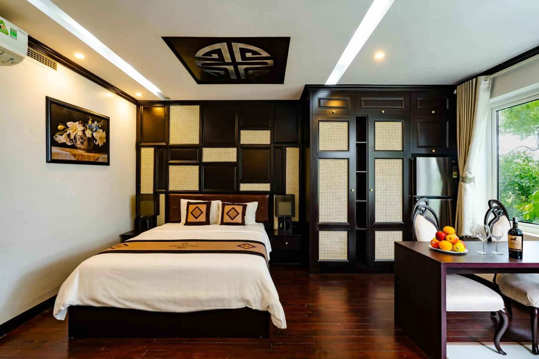 Bed in Wild Lotus Hotel Apartment 2