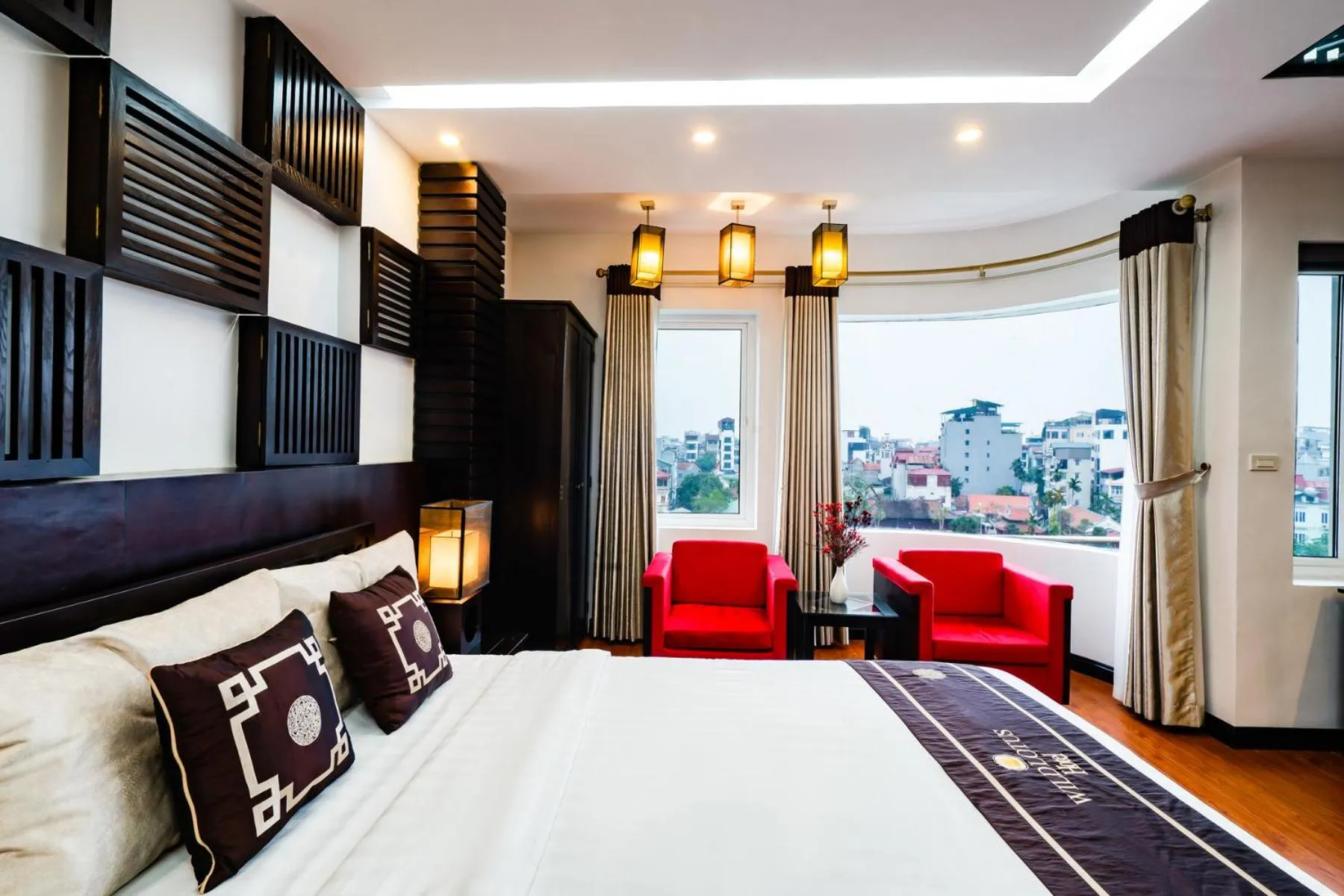 Bed in Wild Lotus Hotel Apartment 2