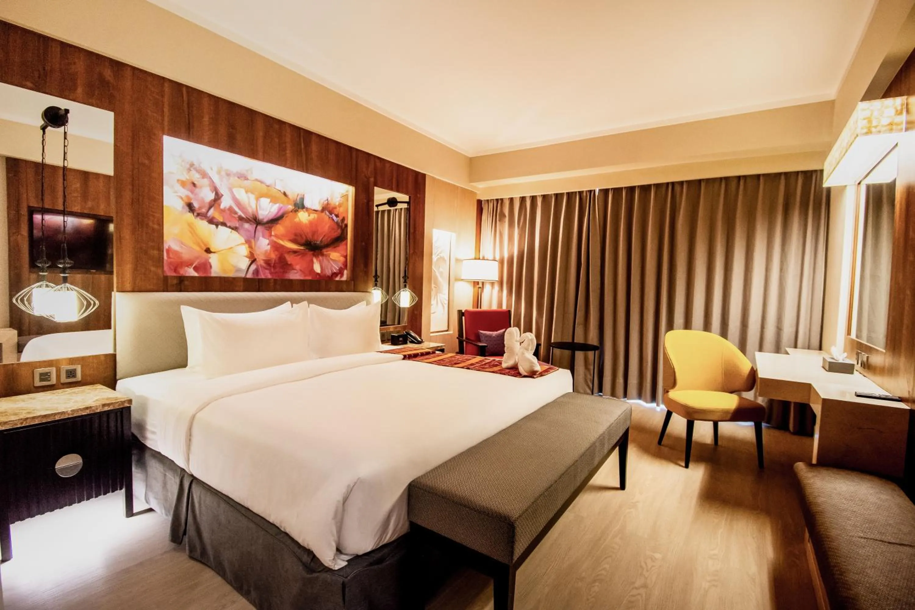 Bed in Mandarin Bay Resort and Spa