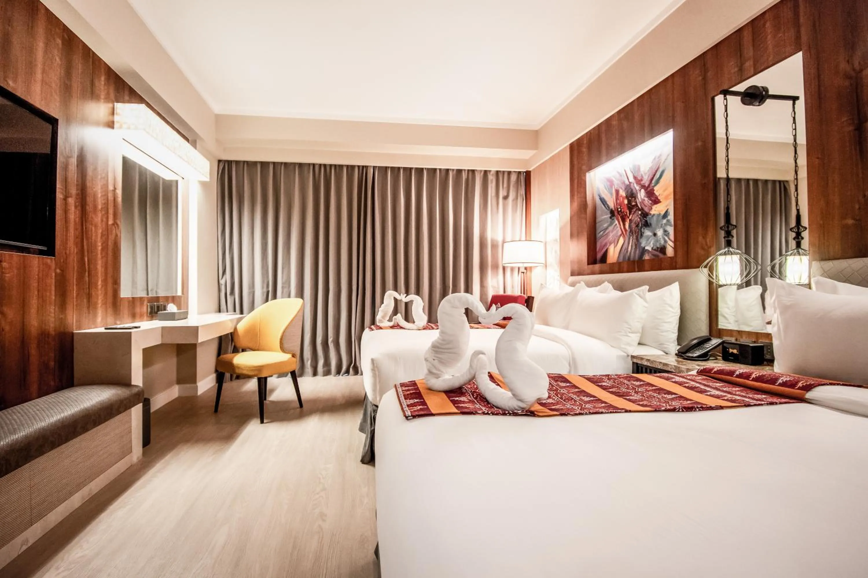 Bed in Mandarin Bay Resort and Spa