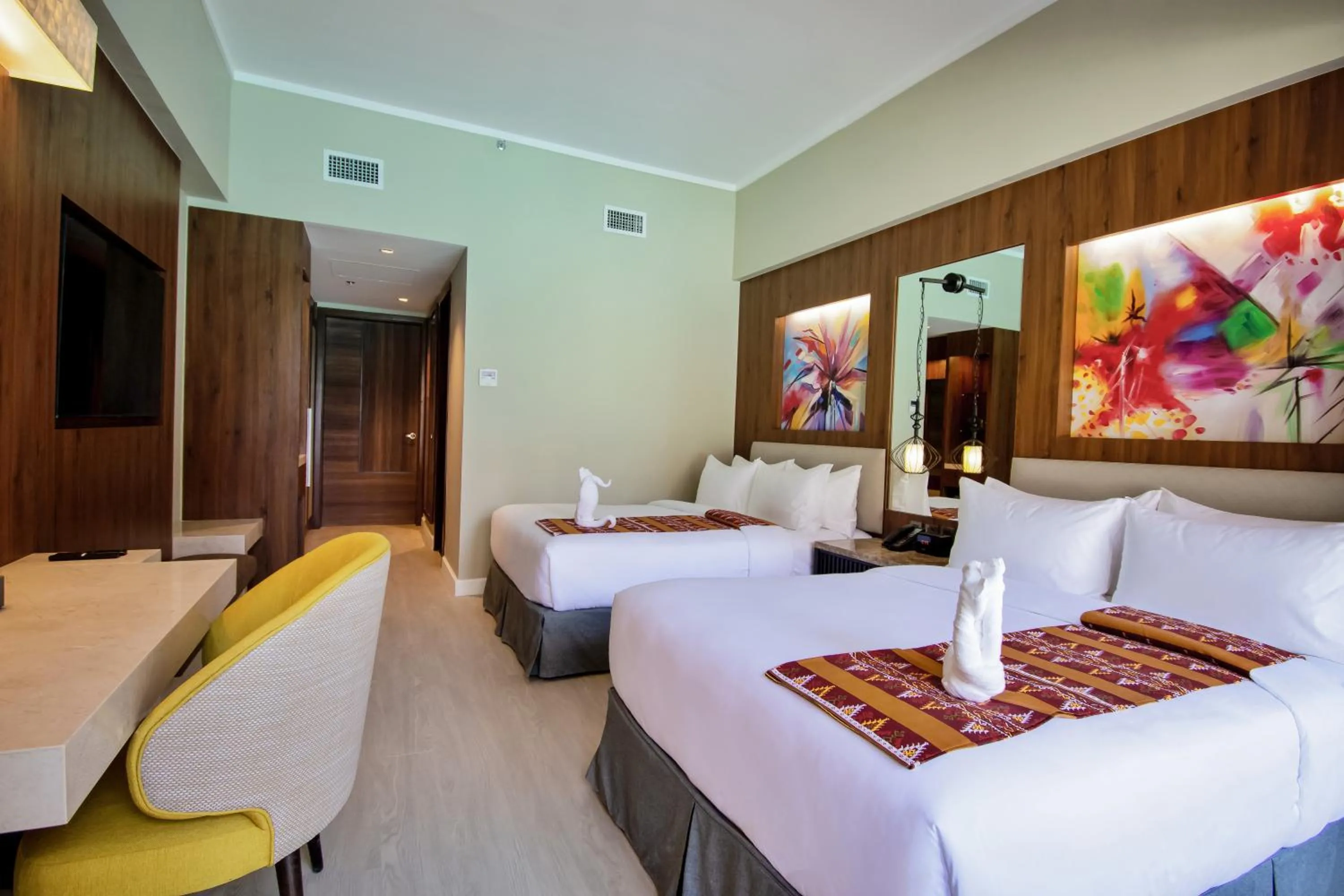 Bed in Mandarin Bay Resort and Spa