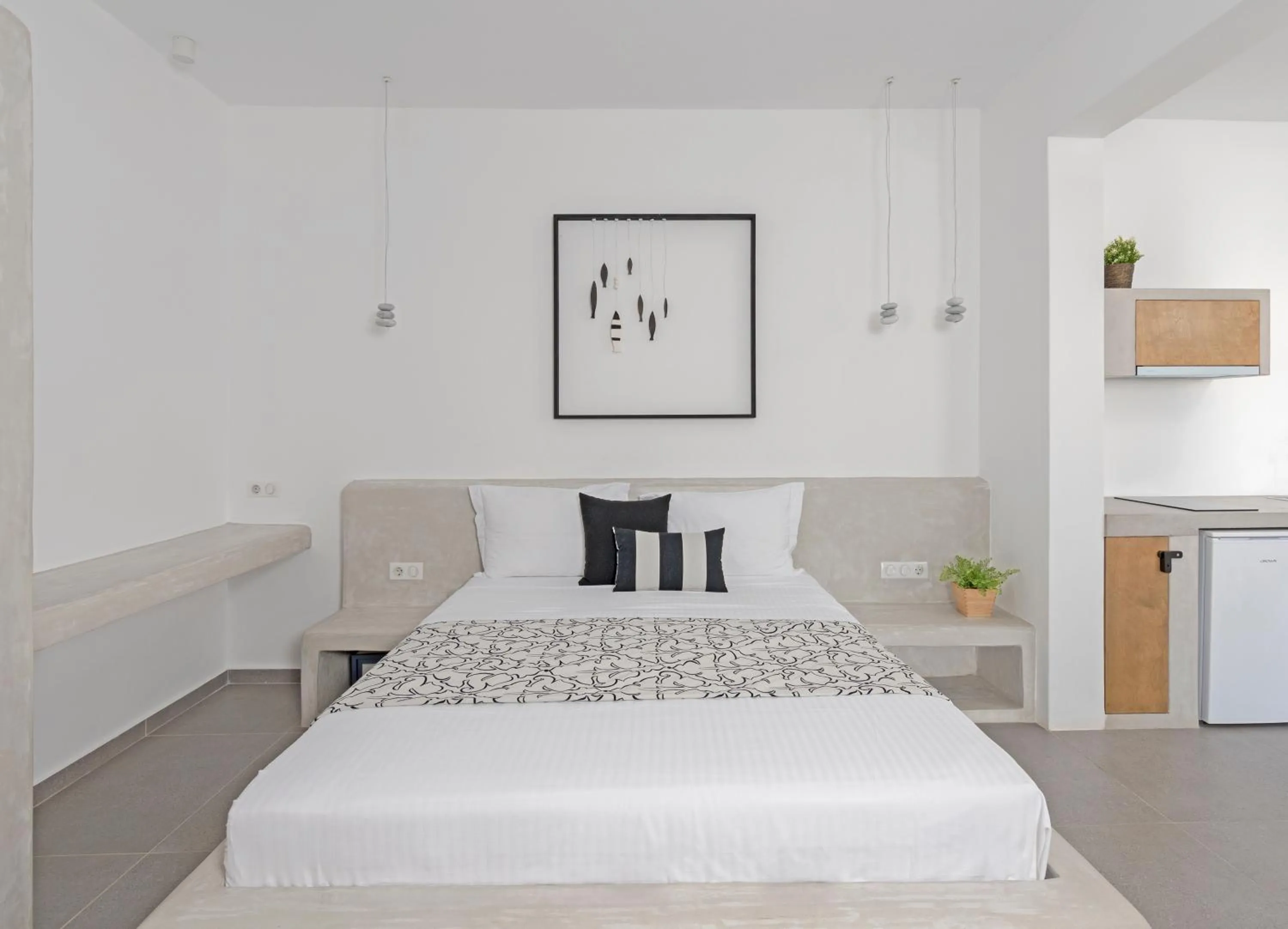 Bed in Anatoli Luxury Studios & Suites