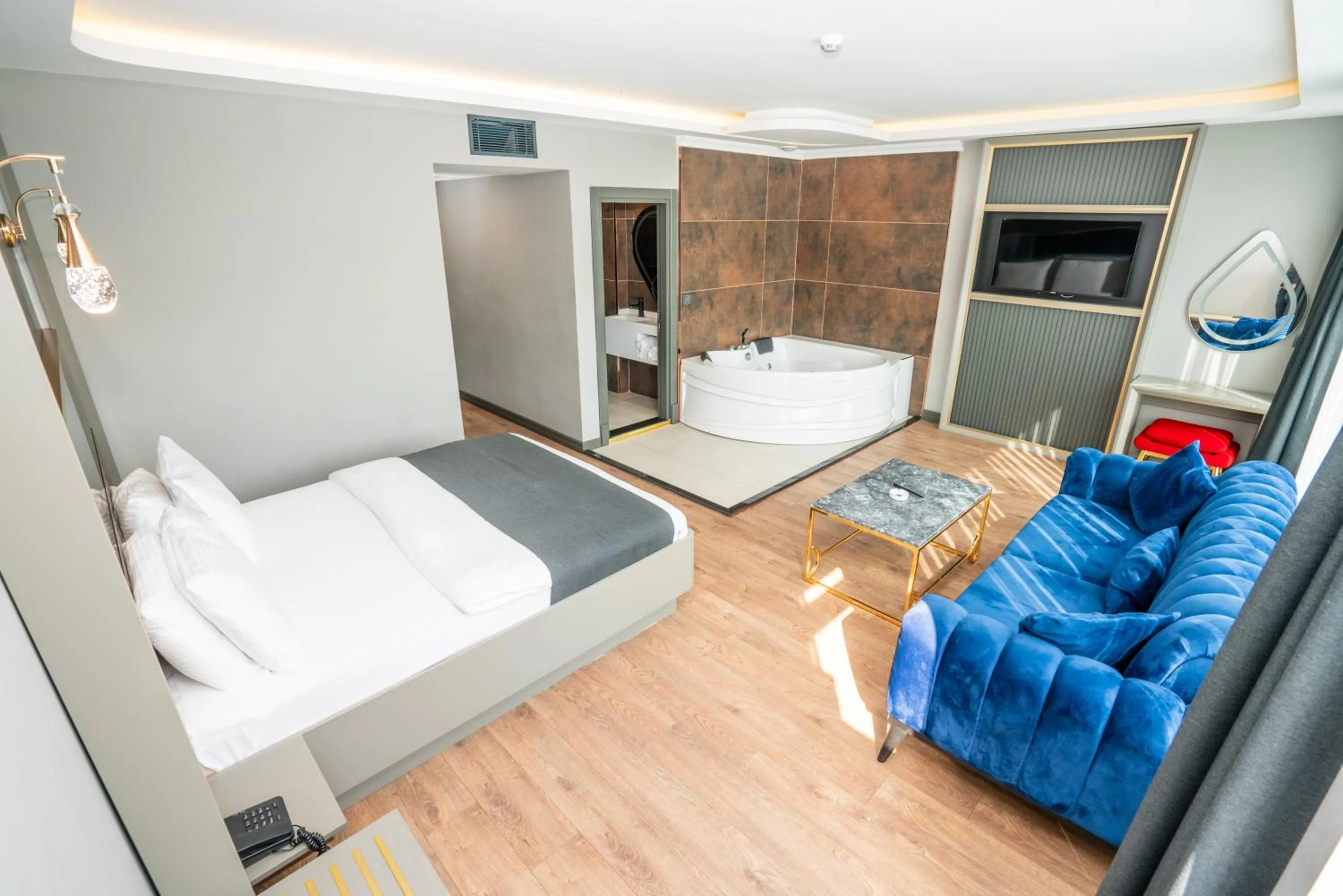 Photo of the whole room, Bed in 216 Ruby Suite