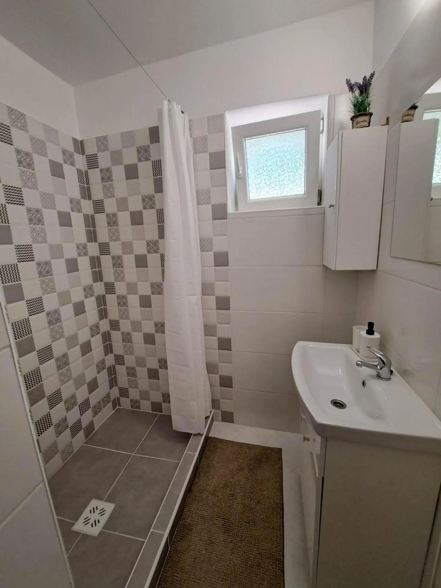 Bathroom in Milla Apartmanok