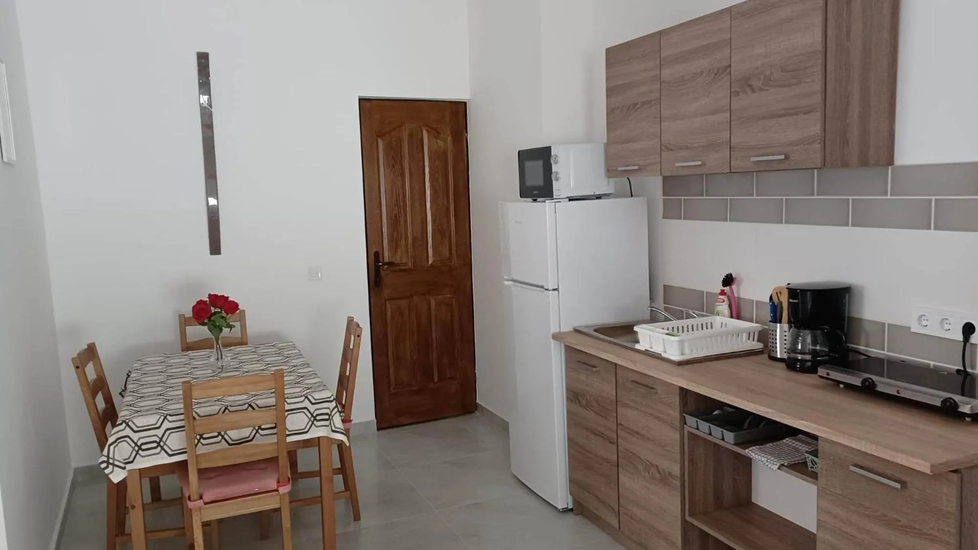 Kitchen or kitchenette in Milla Apartmanok