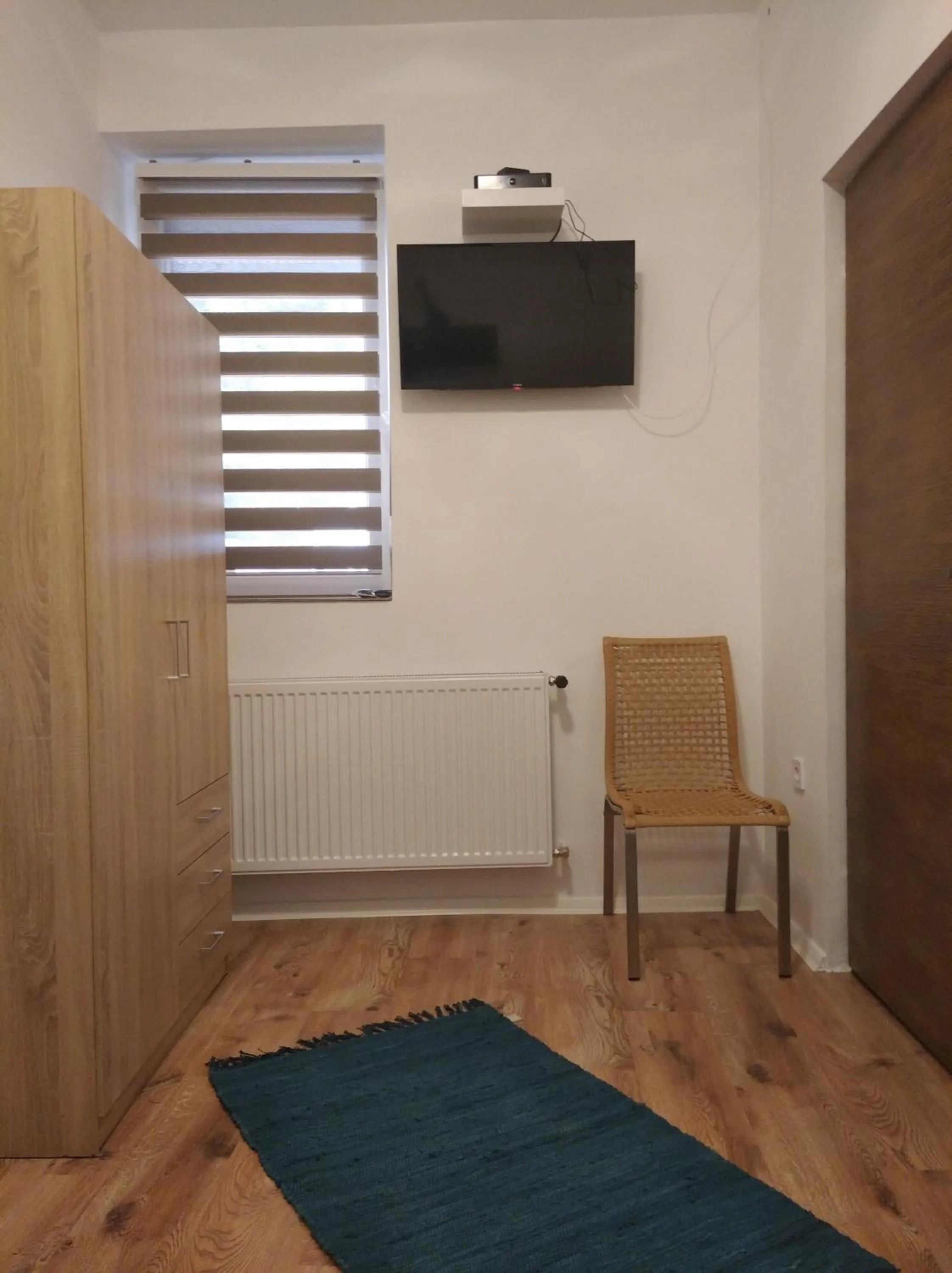 Bedroom in Milla Apartmanok