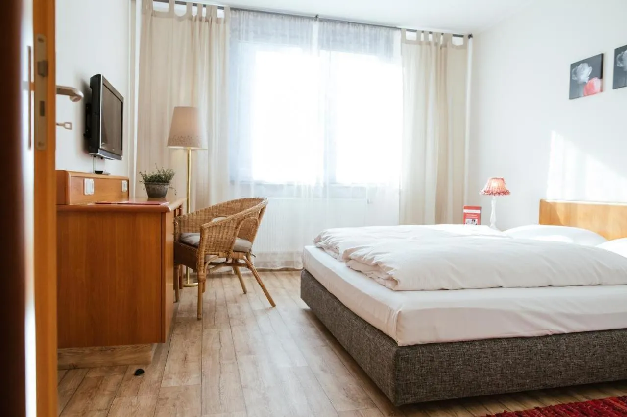 Photo of the whole room, Bed in Hotel Rosenstadt & Malxestube Restaurant