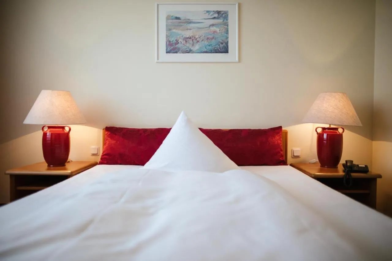 Photo of the whole room, Bed in Hotel Rosenstadt & Malxestube Restaurant