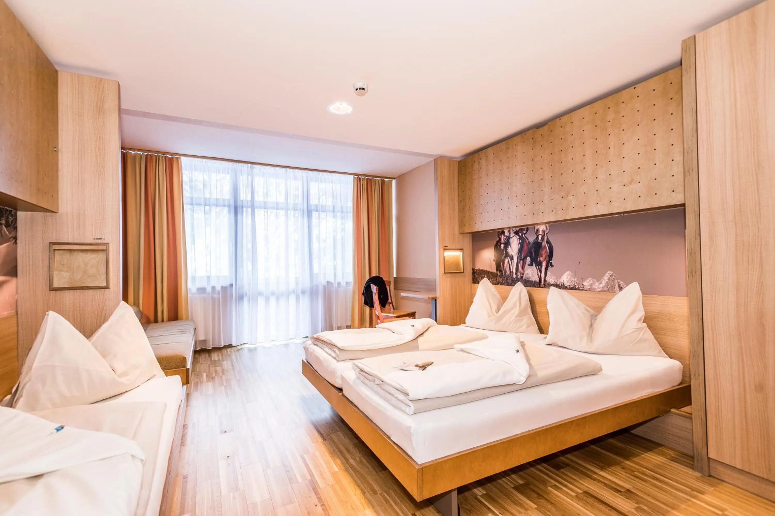 Photo of the whole room, Bed in JUFA Hotel Altenmarkt-Zauchensee