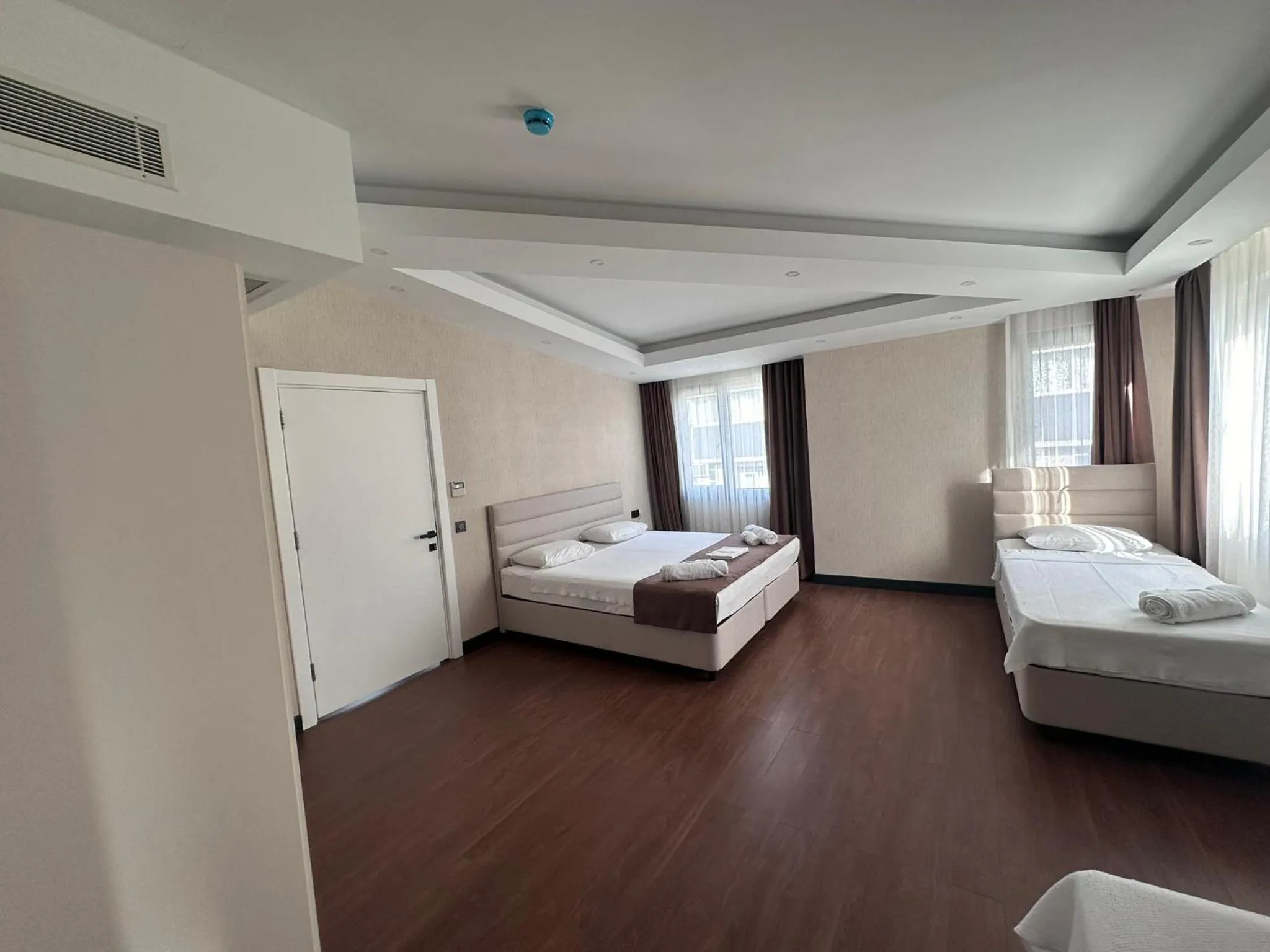 Bed in STAR SUIT HOTEL