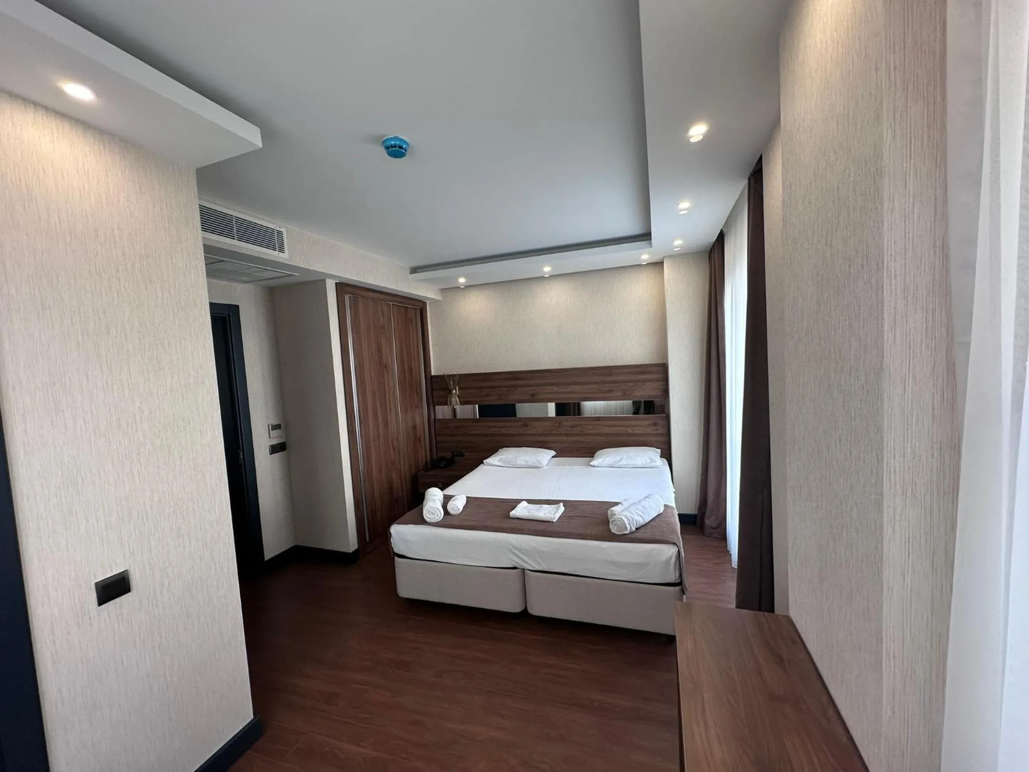 Bed in STAR SUIT HOTEL