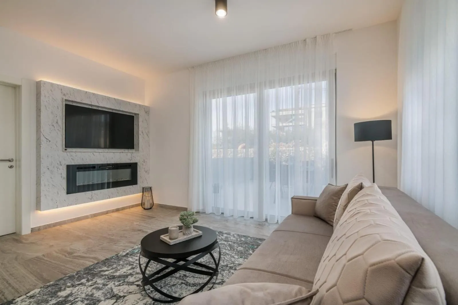 Communal lounge/ TV room in Harmony Luxury Villa