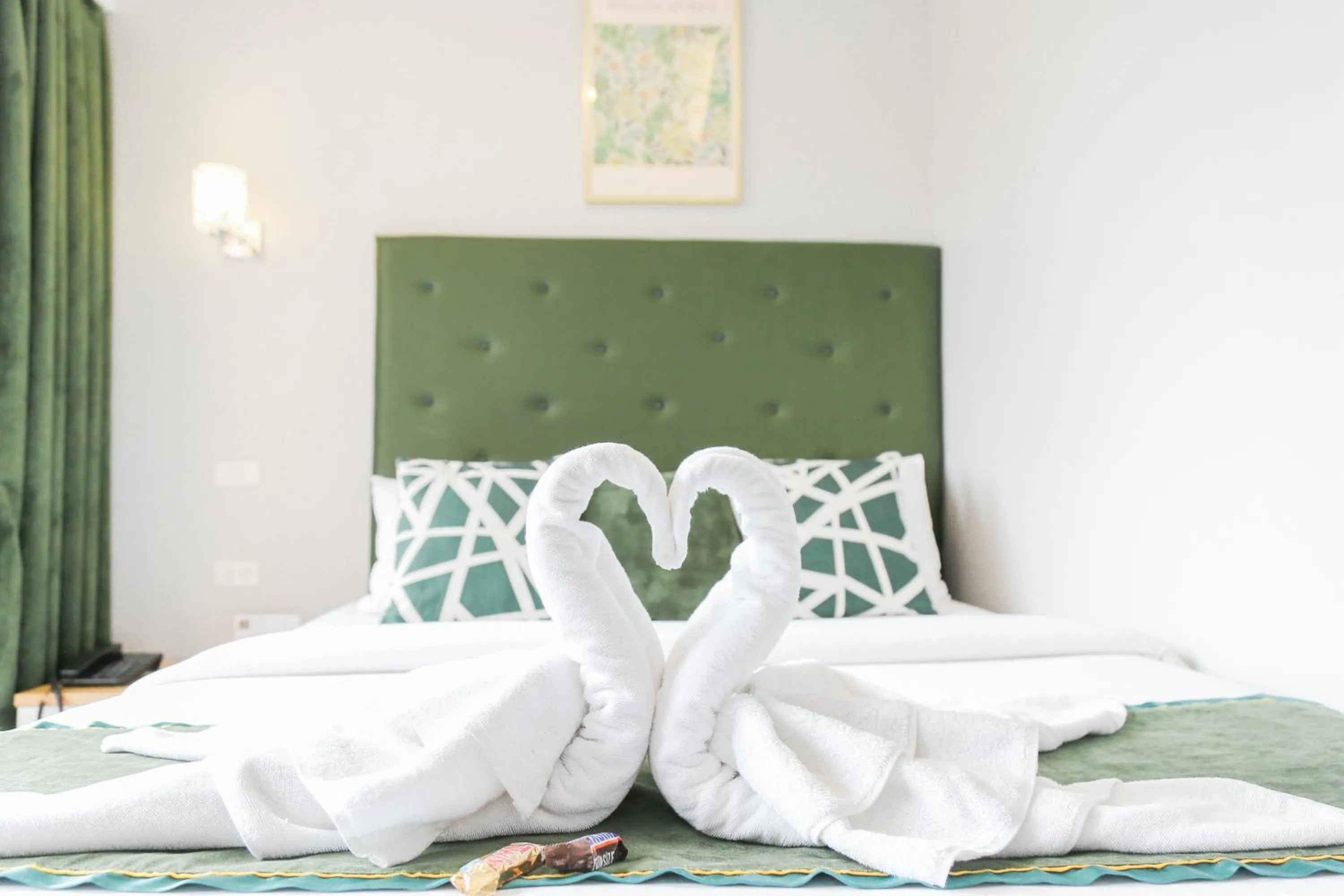 Bed in Pacific Bay Grand Suites