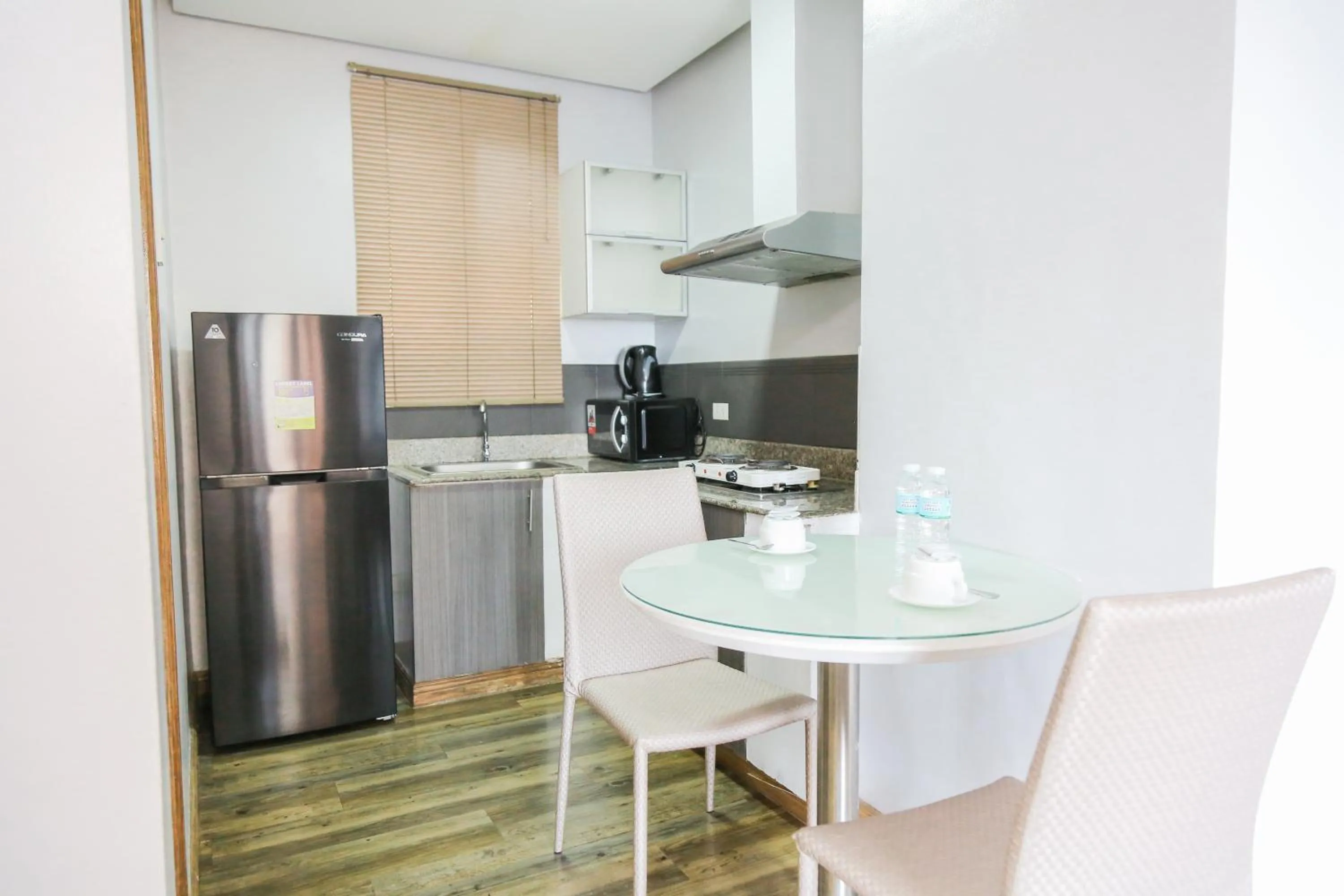 Dining area in Pacific Bay Grand Suites