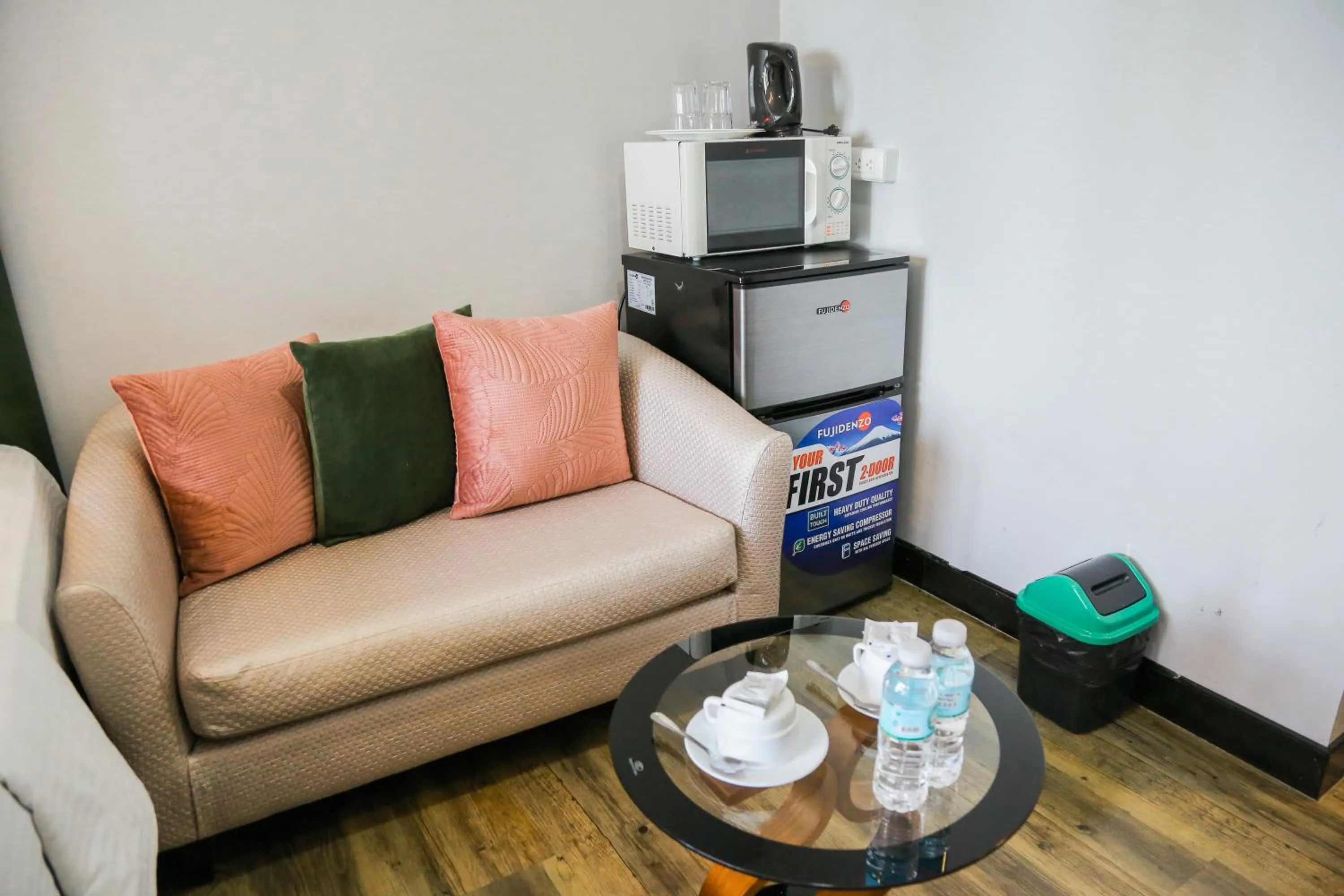 Seating area in Pacific Bay Grand Suites