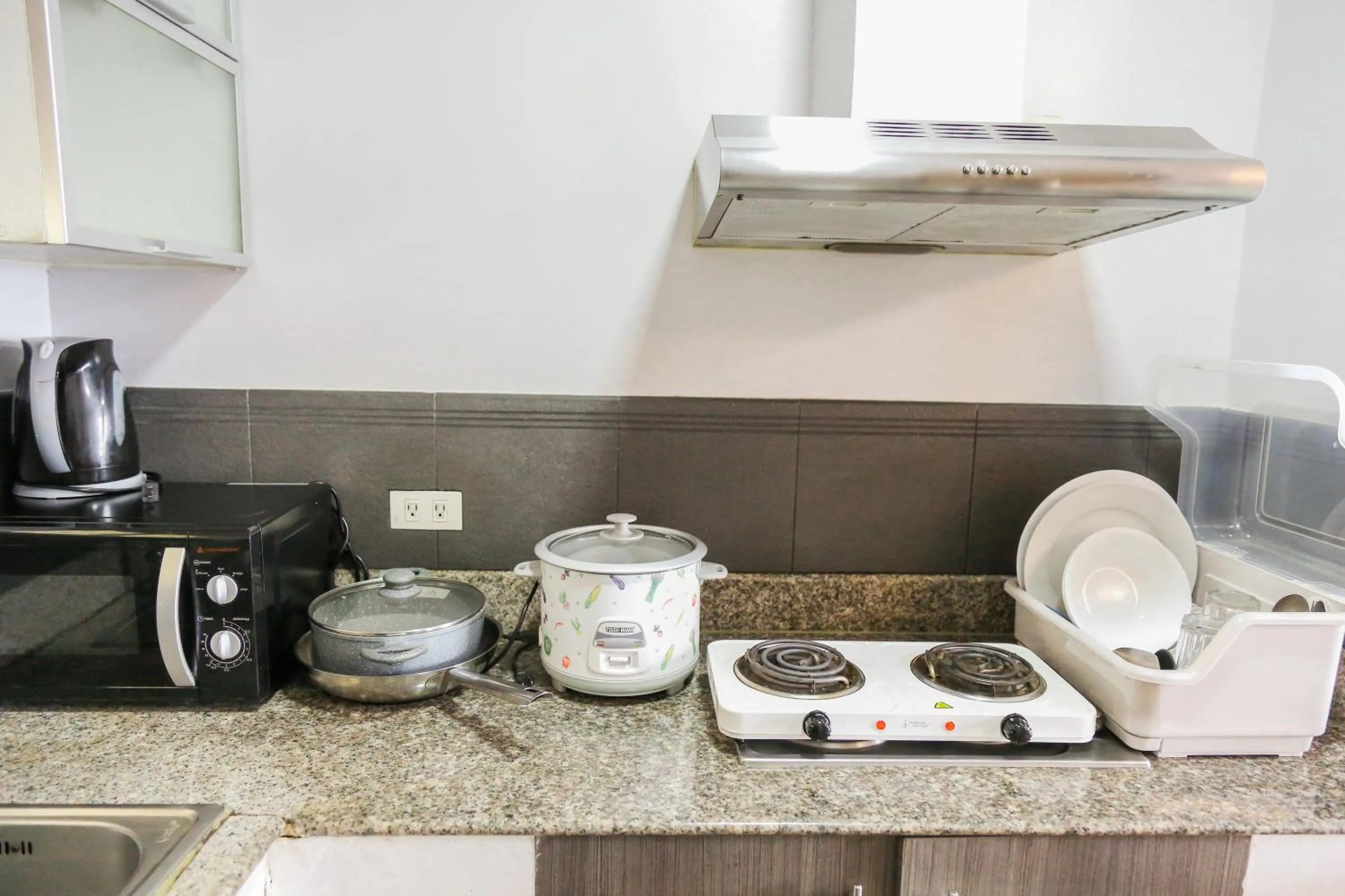 Kitchen or kitchenette in Pacific Bay Grand Suites