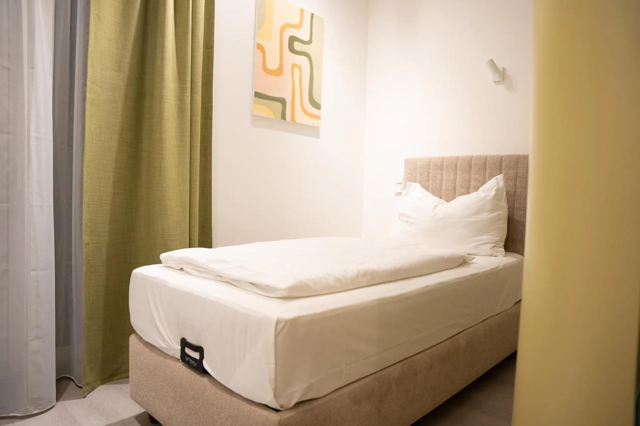 Bed in Primus Hotel & Apartments