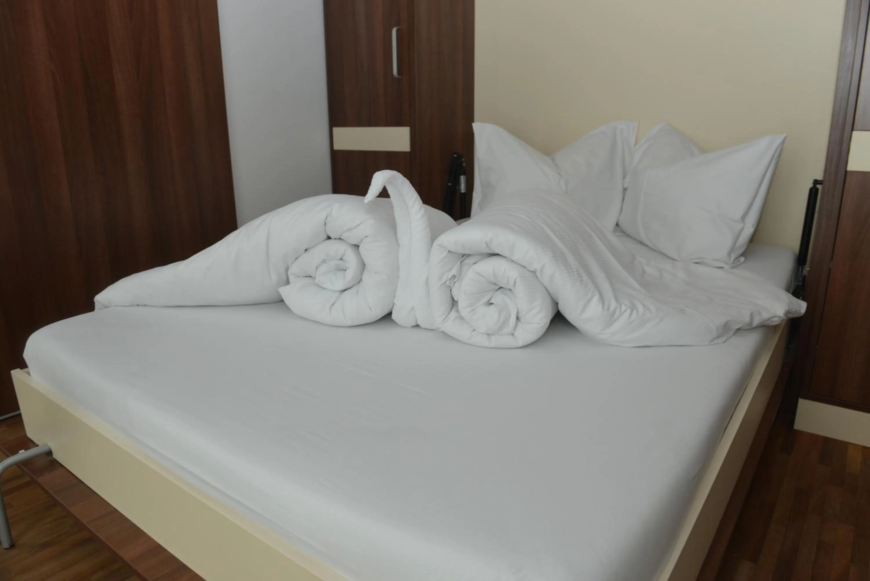 Bed in Primus Hotel & Apartments