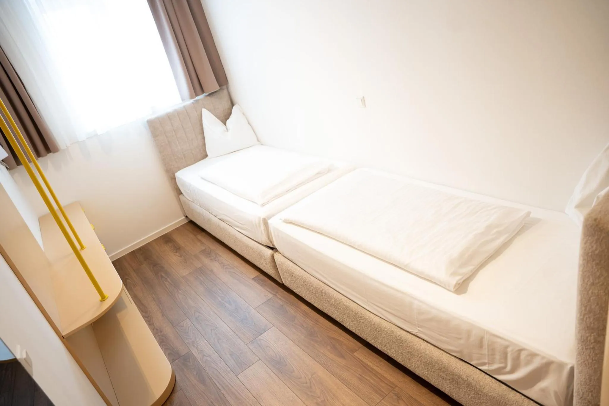 Bed in Primus Hotel & Apartments