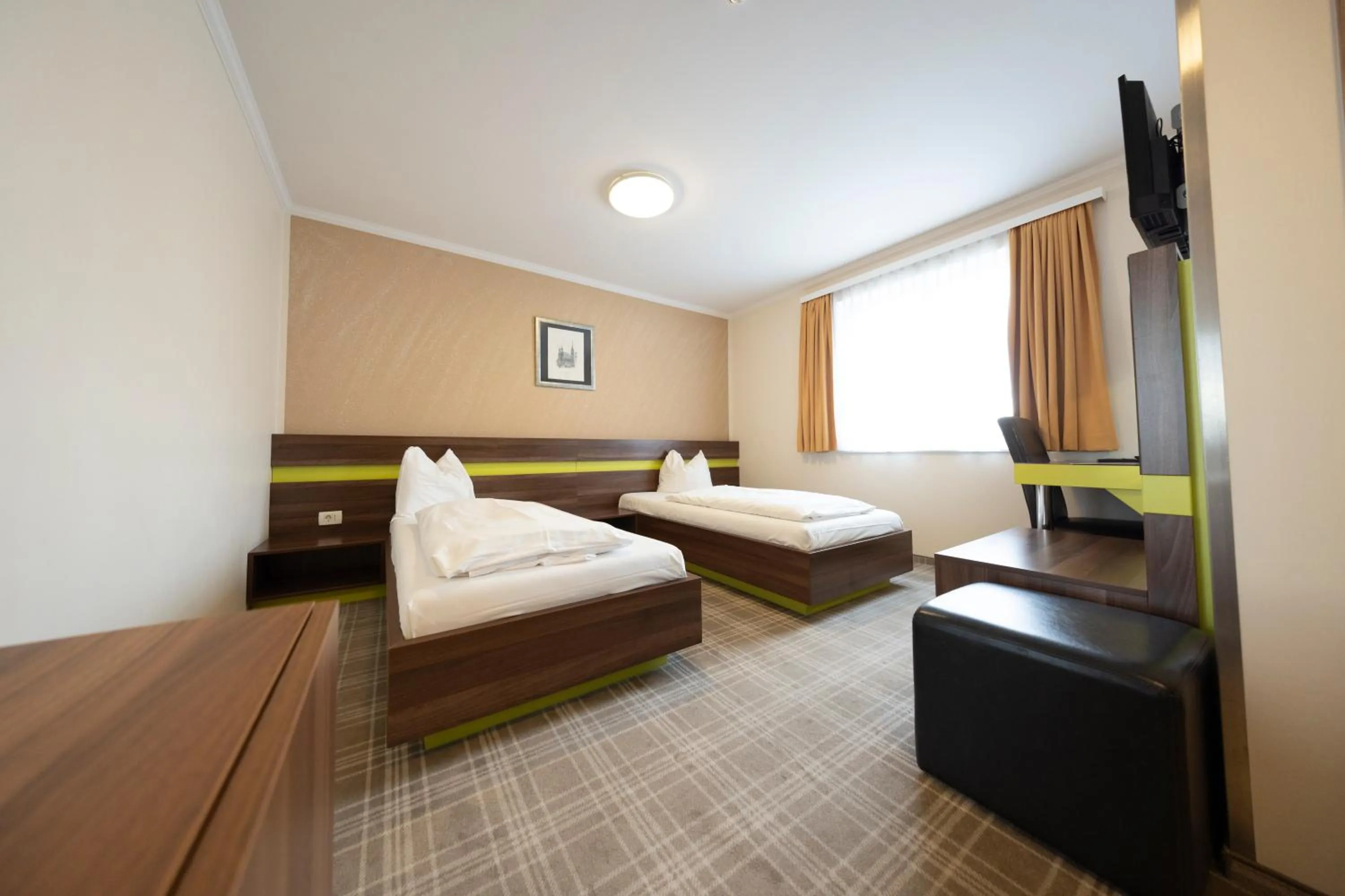 Bed in Primus Hotel & Apartments