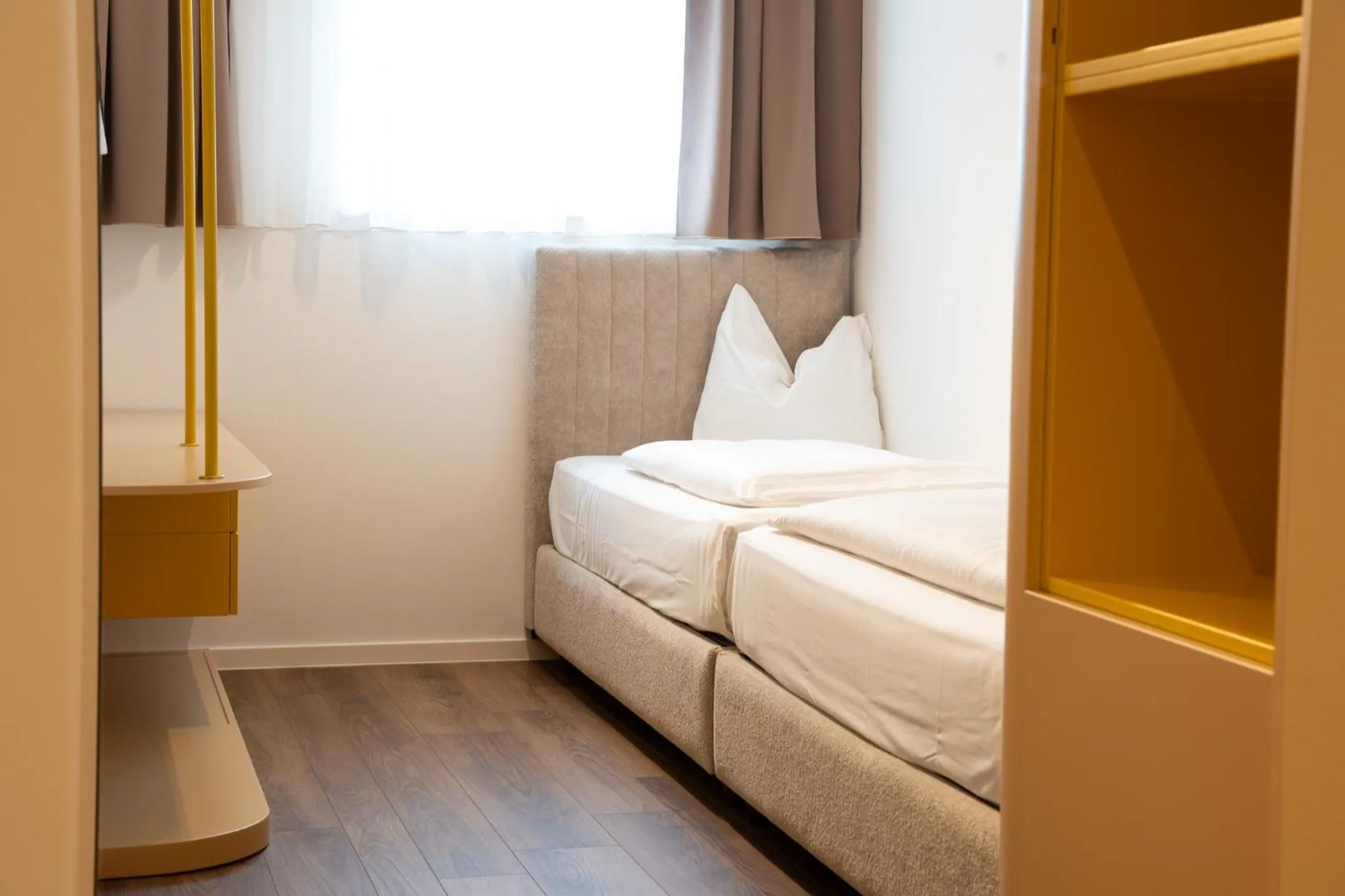 Bed in Primus Hotel & Apartments