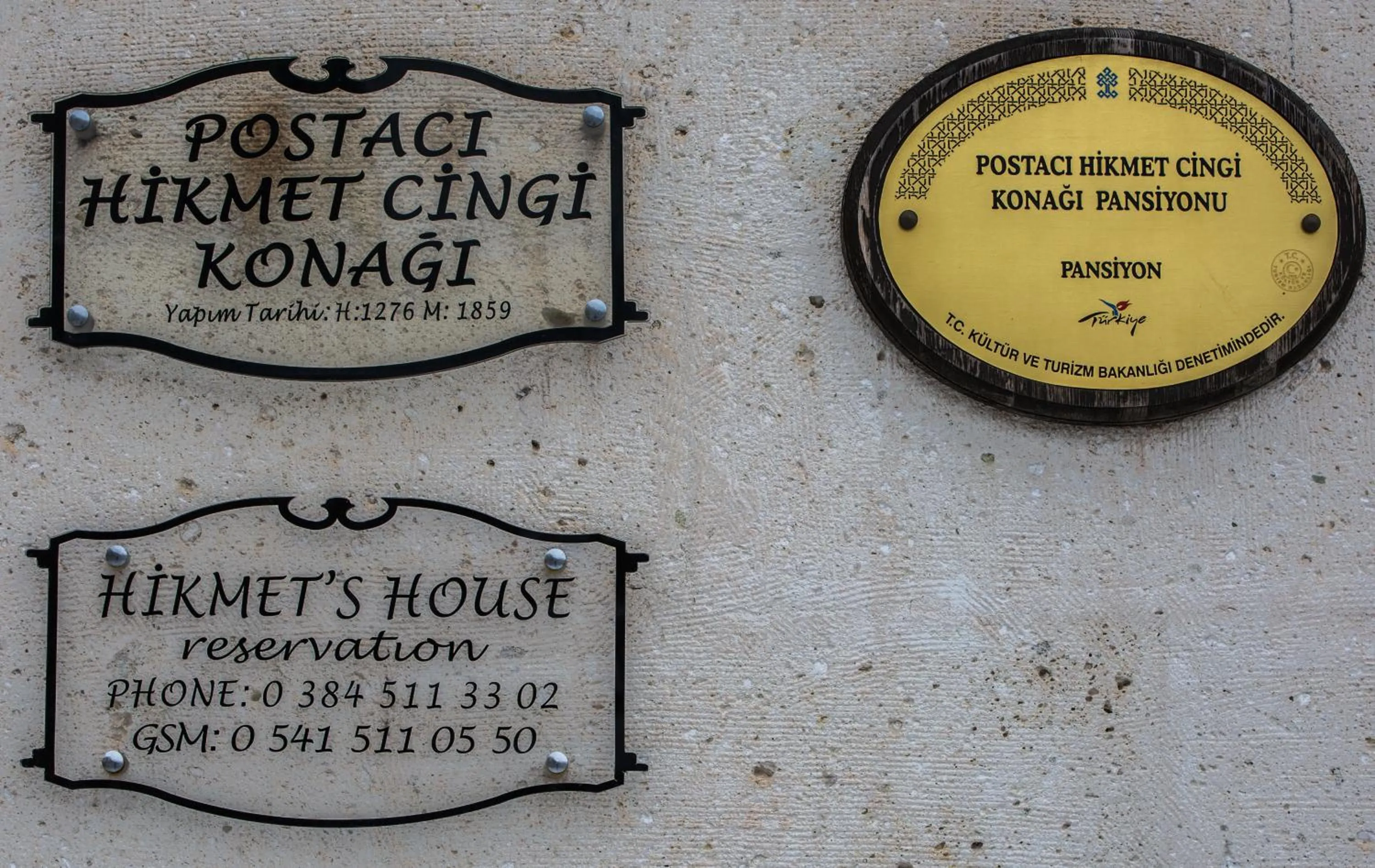 Property logo or sign in Hikmet's House