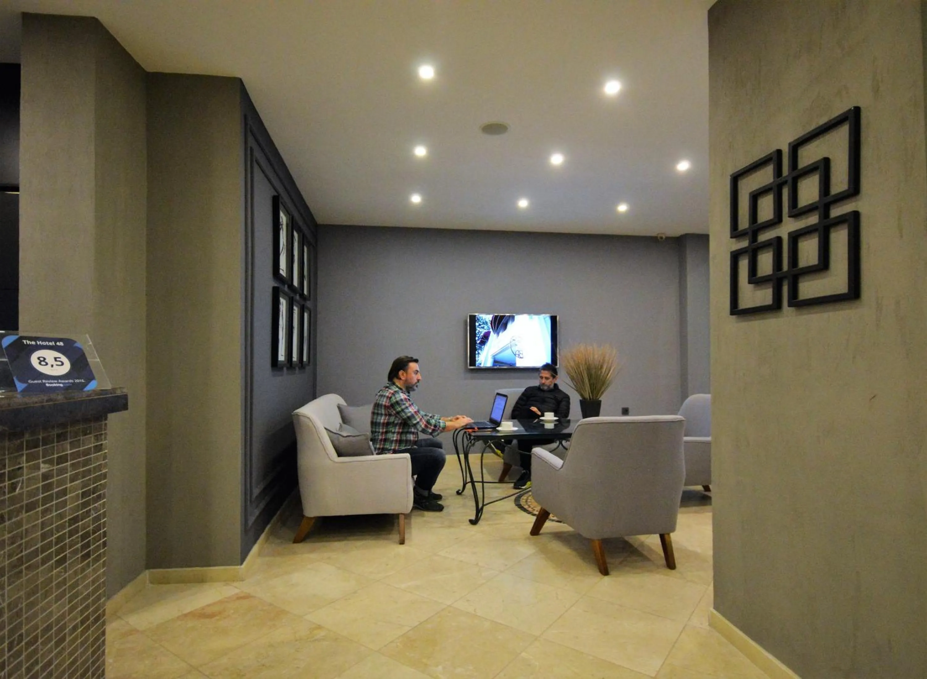 Communal lounge/ TV room in The Hotel 48