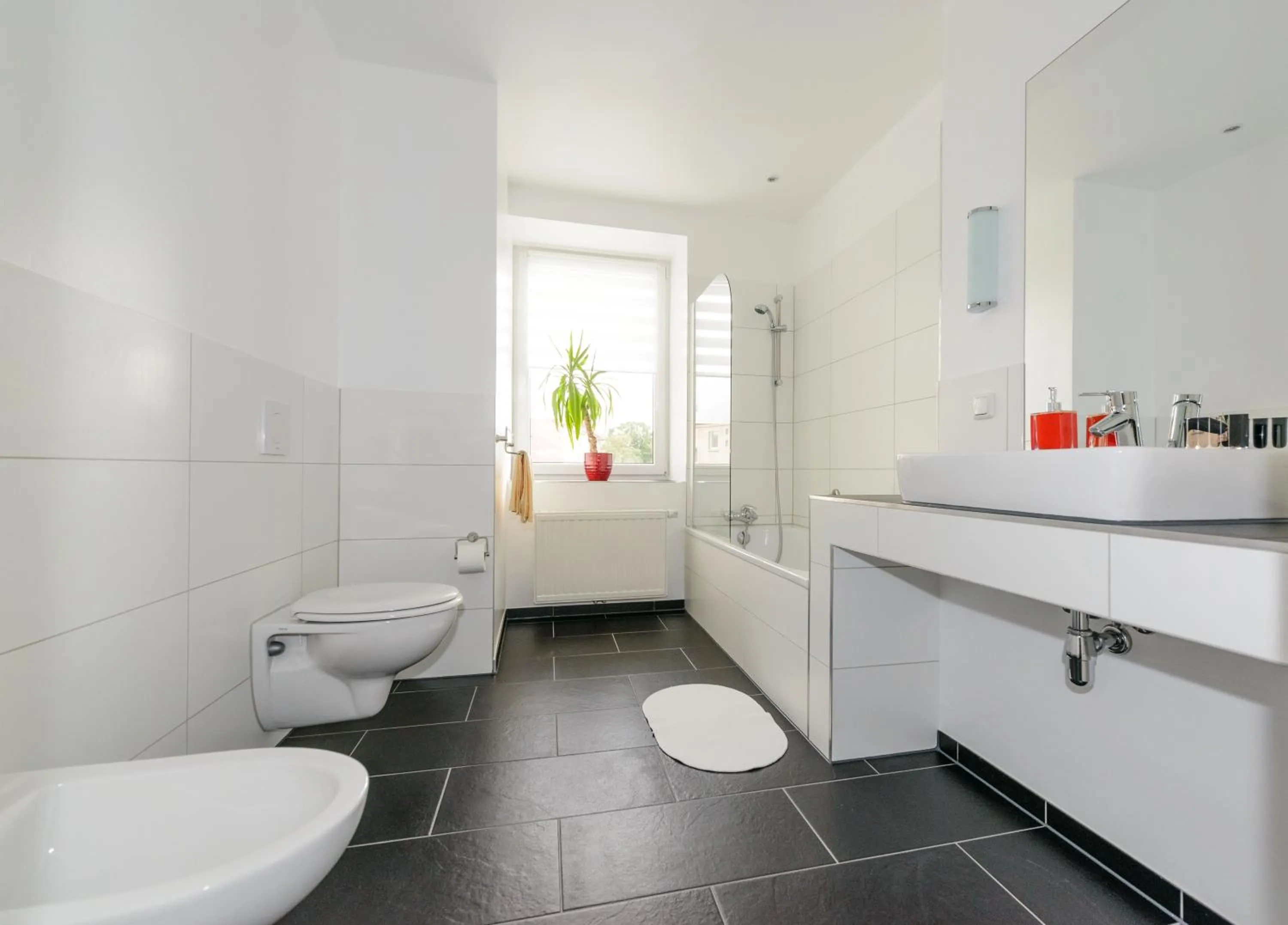 Bathroom in City Hotel-Pension Brandenburg