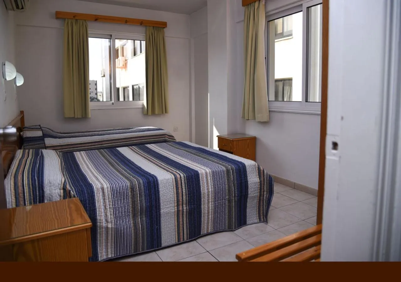 Bed in Elysso Apartments