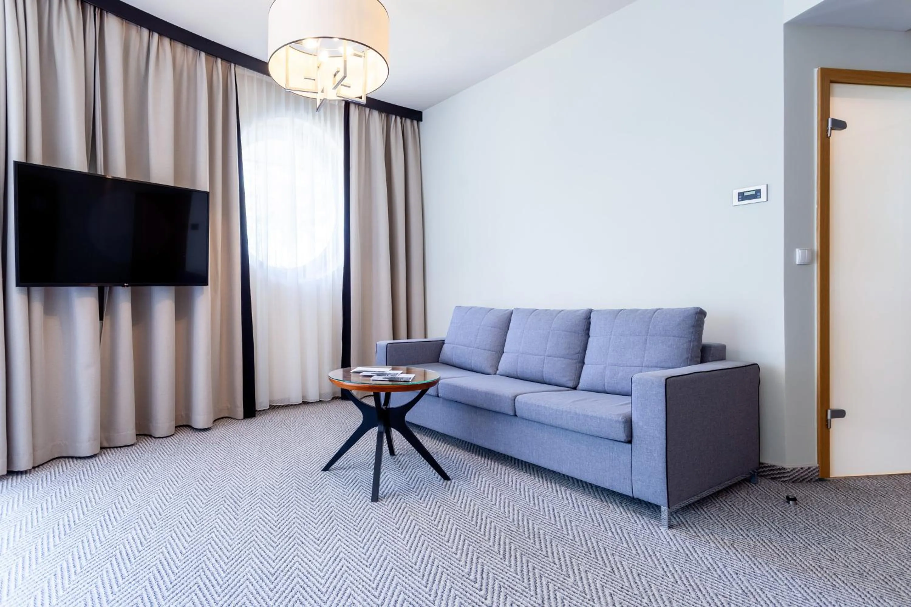 Seating area in Diune Hotel by Zdrojowa