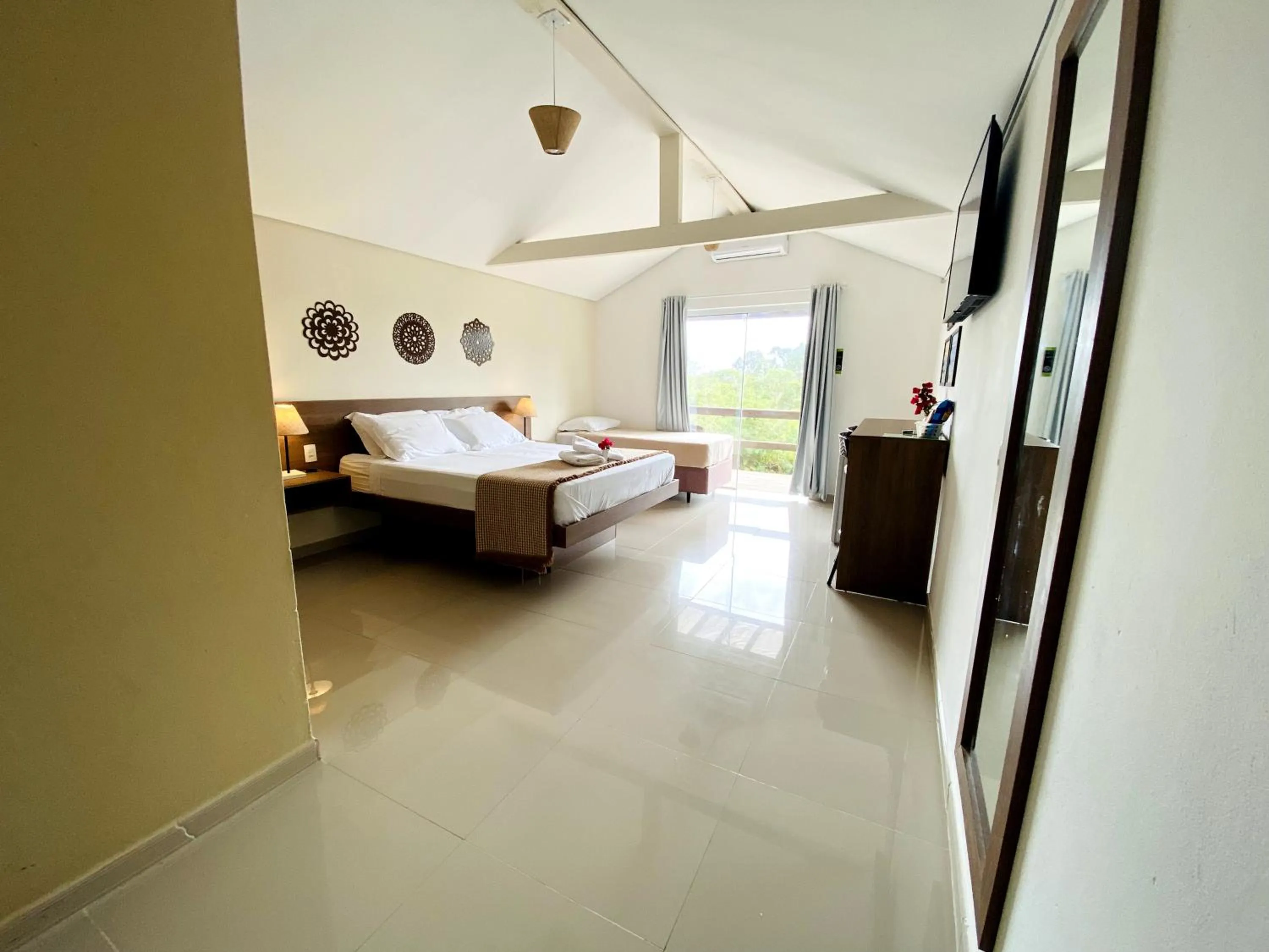 Bed in Pousada Xaxá