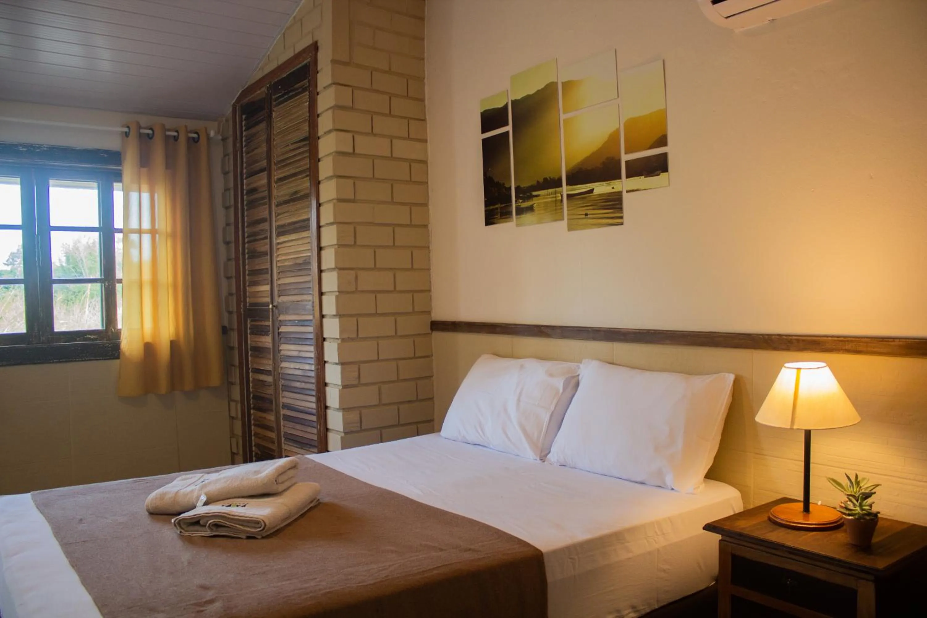 Bed in Pousada Xaxá