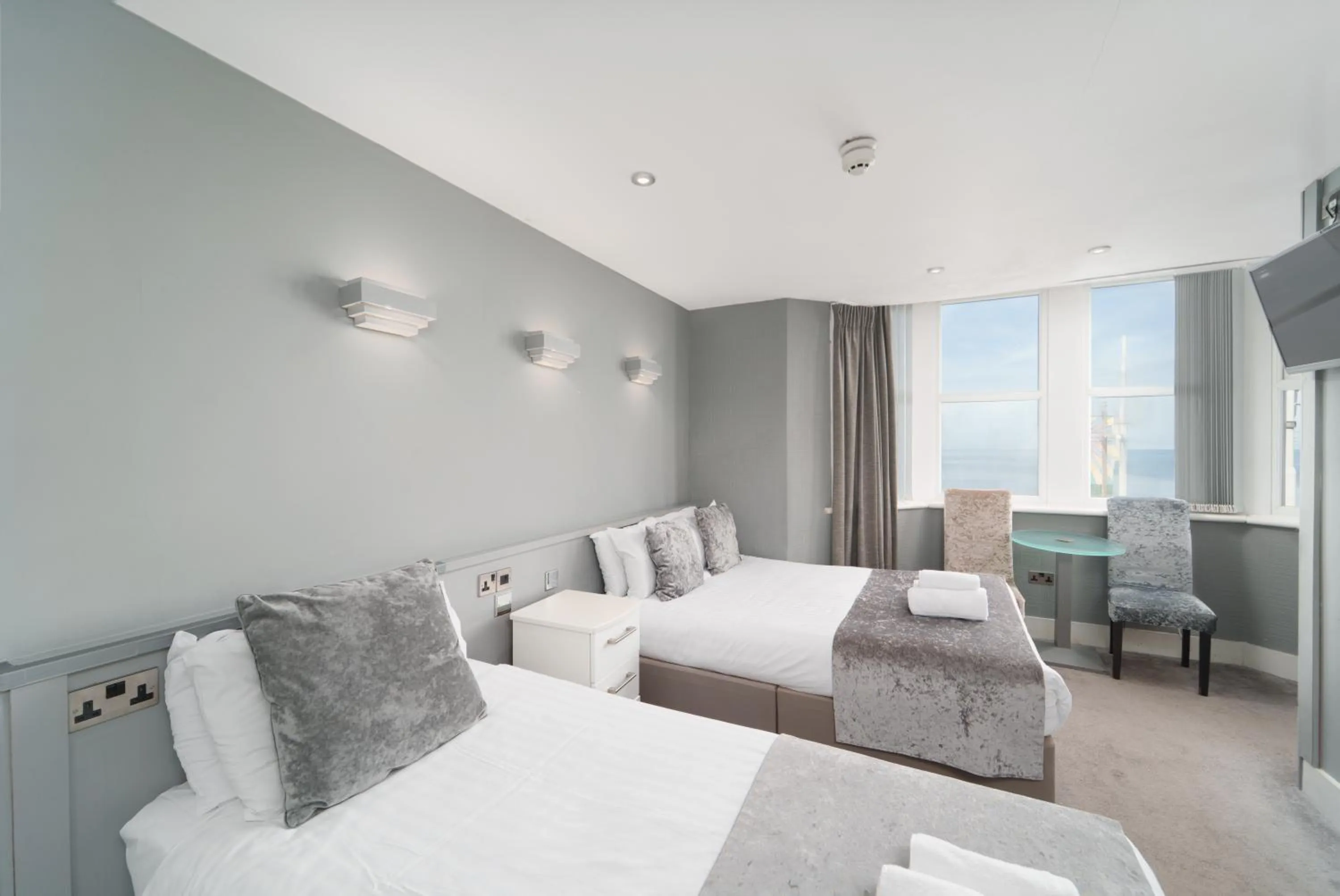 Bed in The Royal Boston Hotel by Compass Hospitality