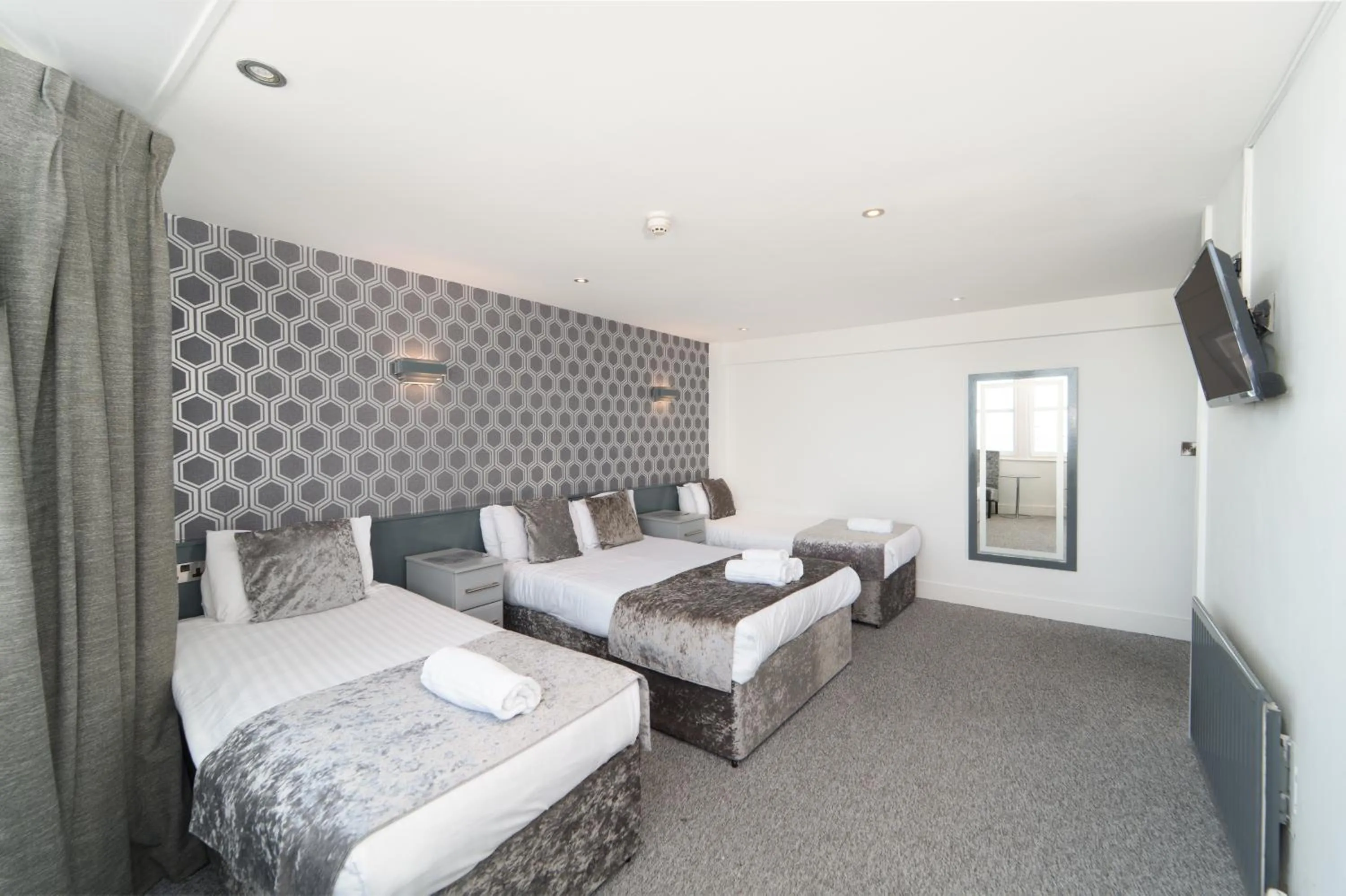 Bed in The Royal Boston Hotel by Compass Hospitality