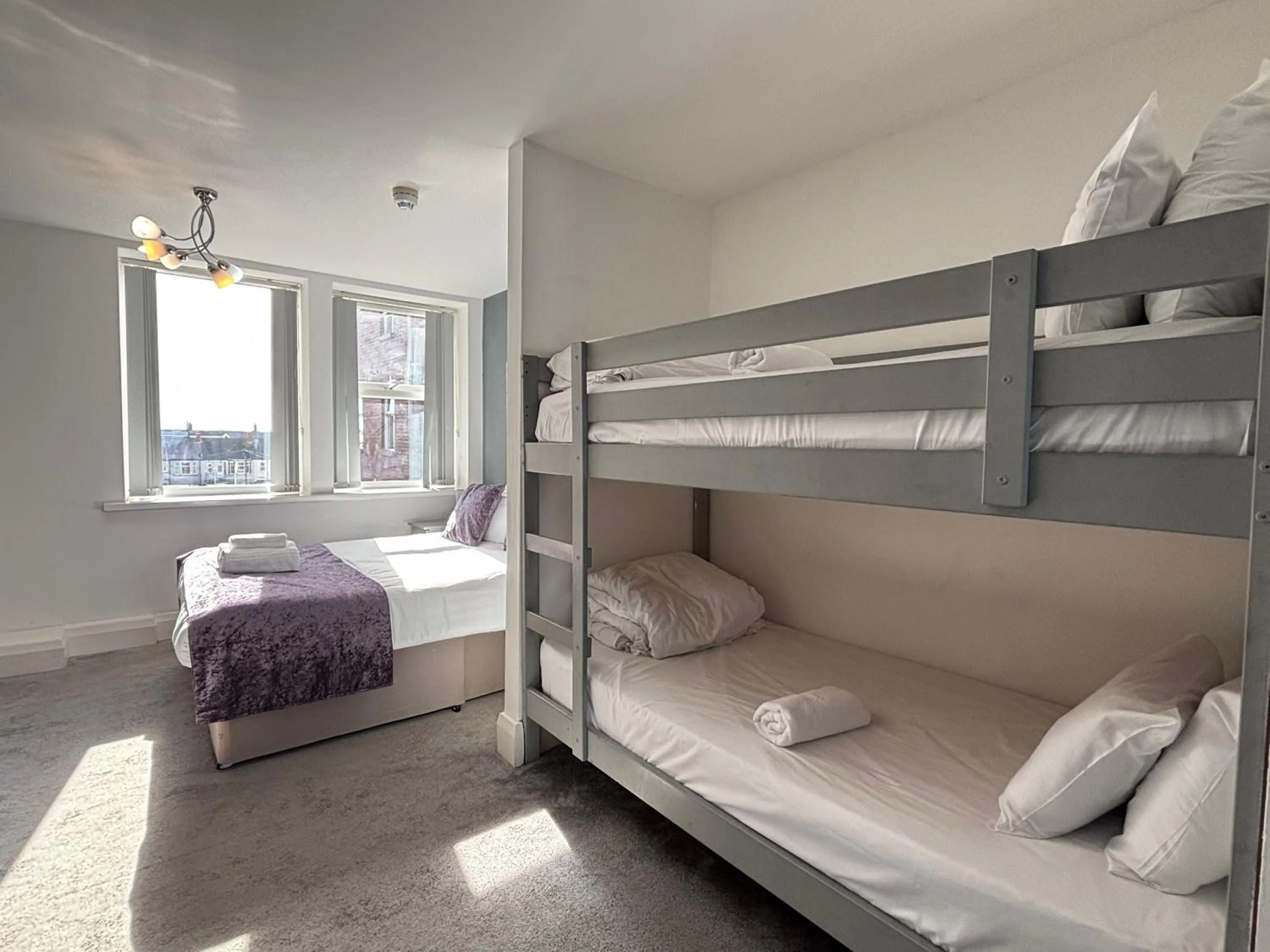 Bed in The Royal Boston Hotel by Compass Hospitality