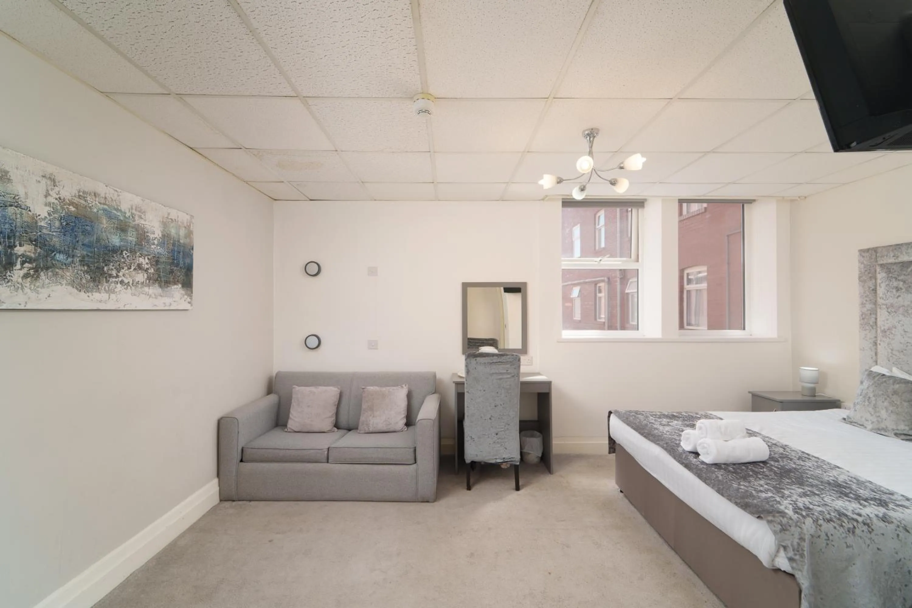 Bed in The Royal Boston Hotel by Compass Hospitality